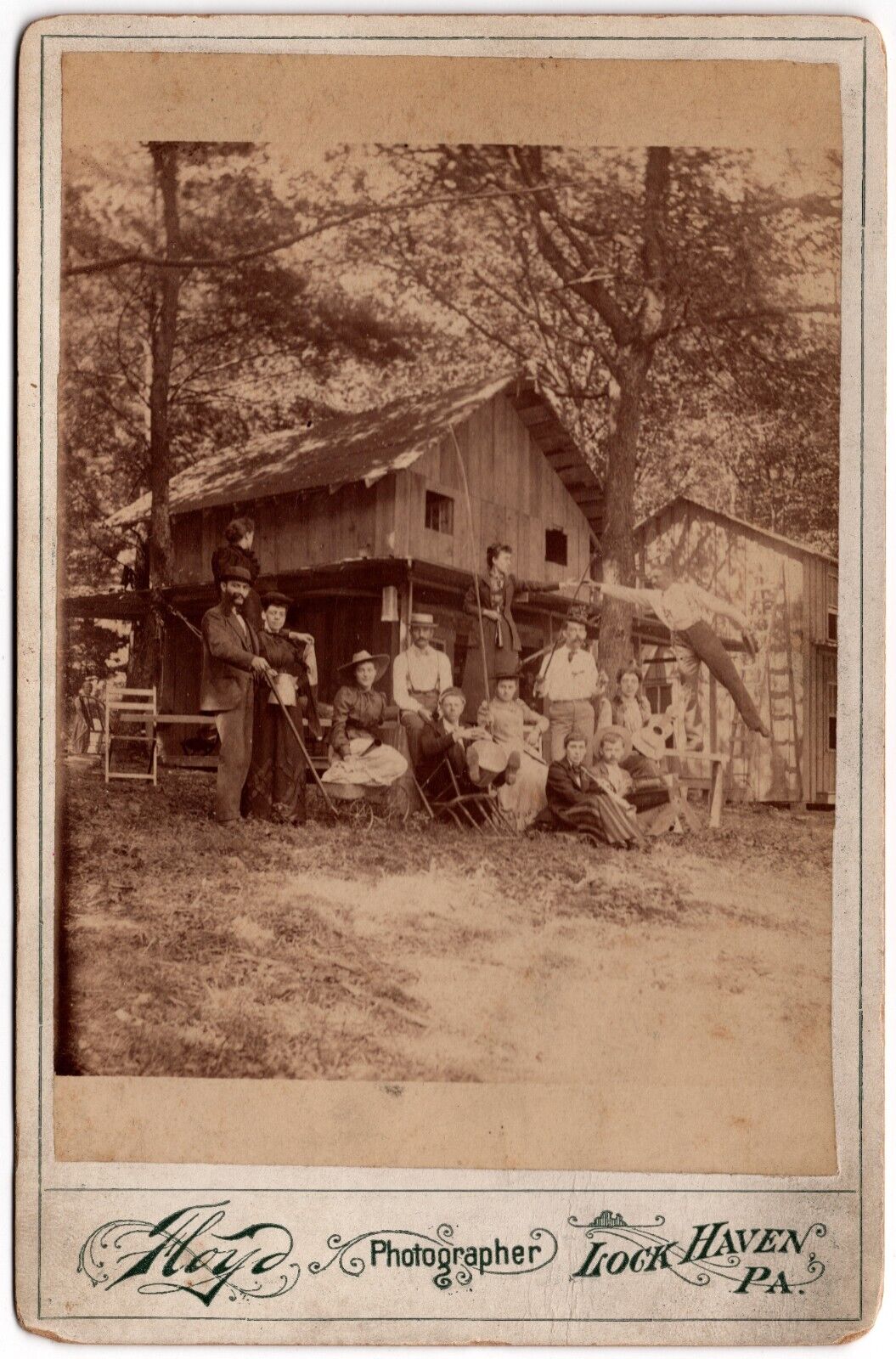 CIRCA 1890s CABINET CARD FLOYD  FAMILY AT HUNTING FISHING LODGE LOCK HAVEN PA.