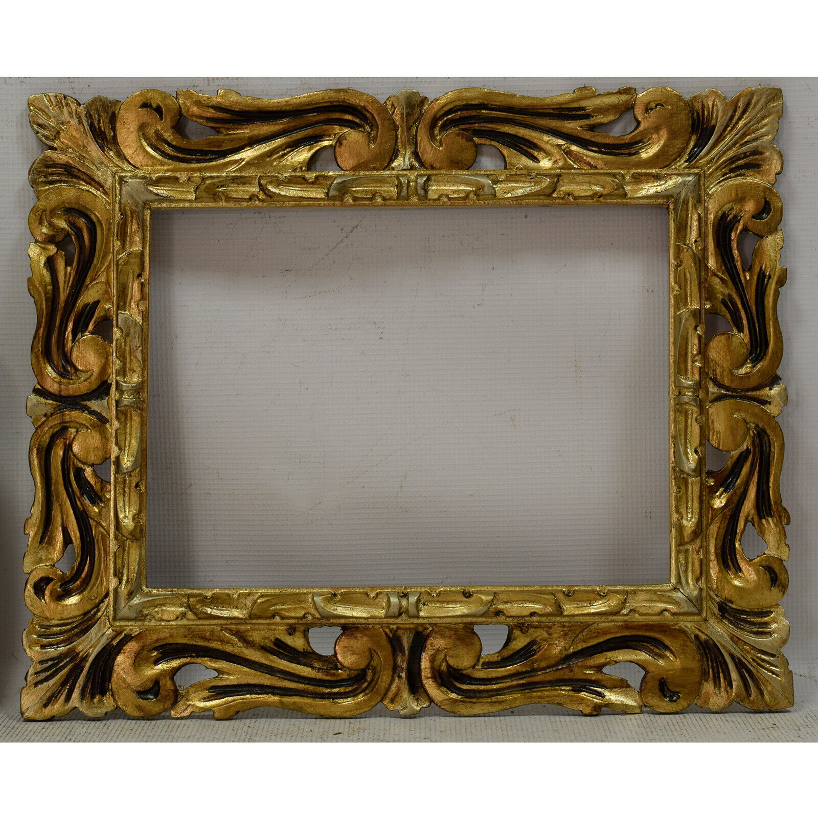 Ca 1900 Old wooden openwork frame with metal leaf Internal: 12x8,6 in