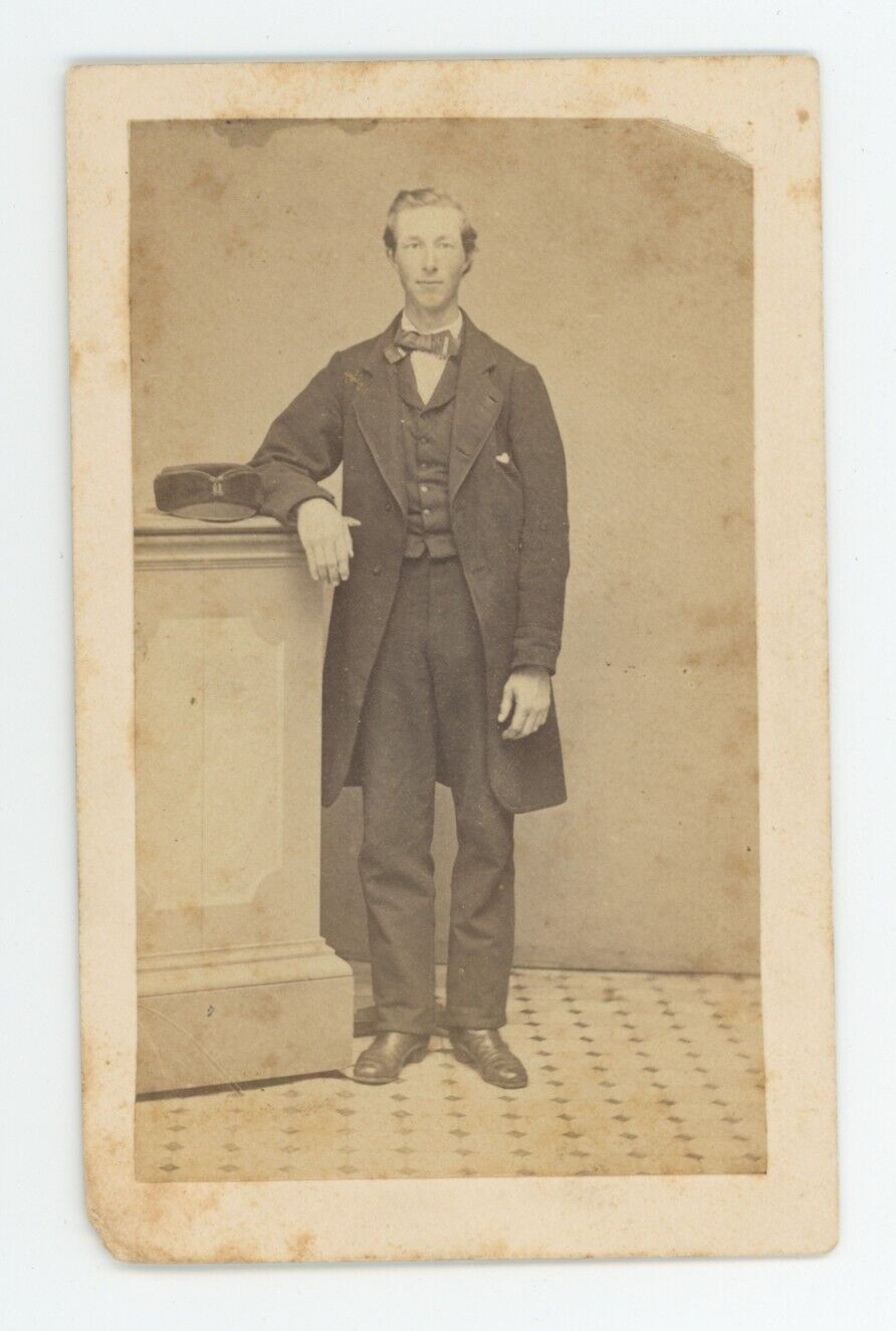 Antique CDV Circa 1870s Tall Handsome Young Man Posing In Long Suit Coat & Tie