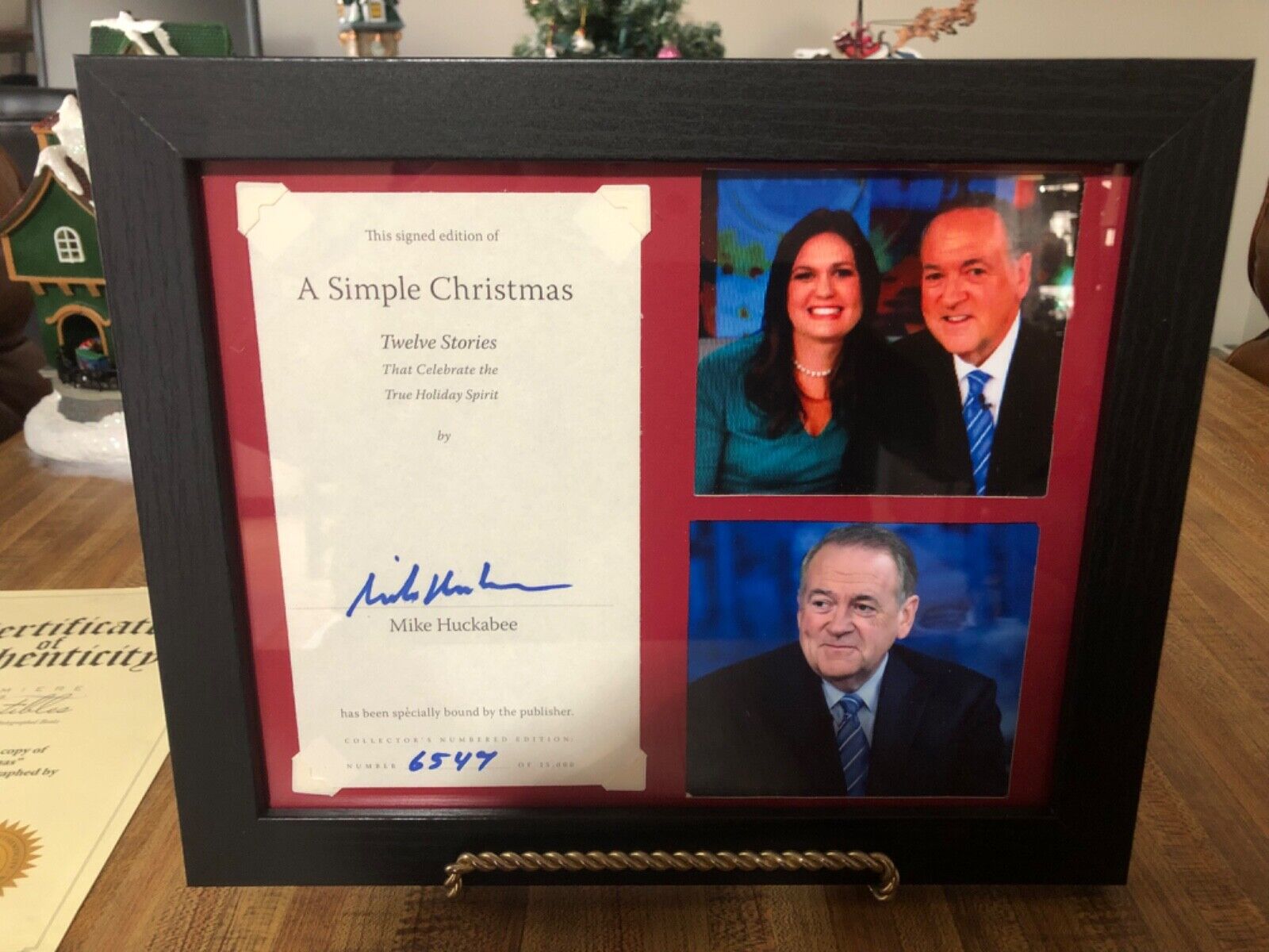 Mike Huckabee signed LE book page(F&M)