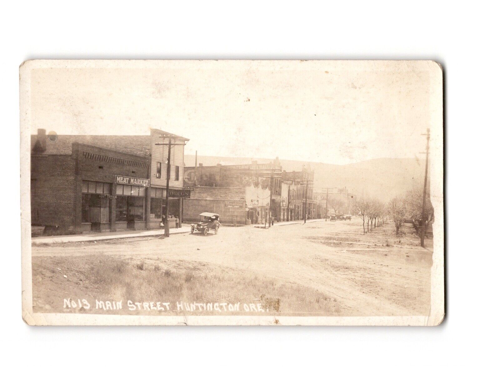 RPPC Vintage Postcard Main Street Huntington, OR Early 1900's Meat Market Sign