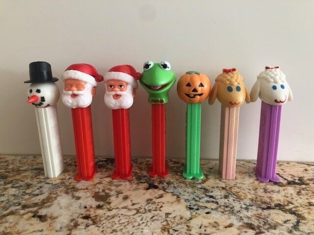Lot Of 7 PEZ Vintage Dispensers Santa, Kermit , Halloween, Snowman, Lamb