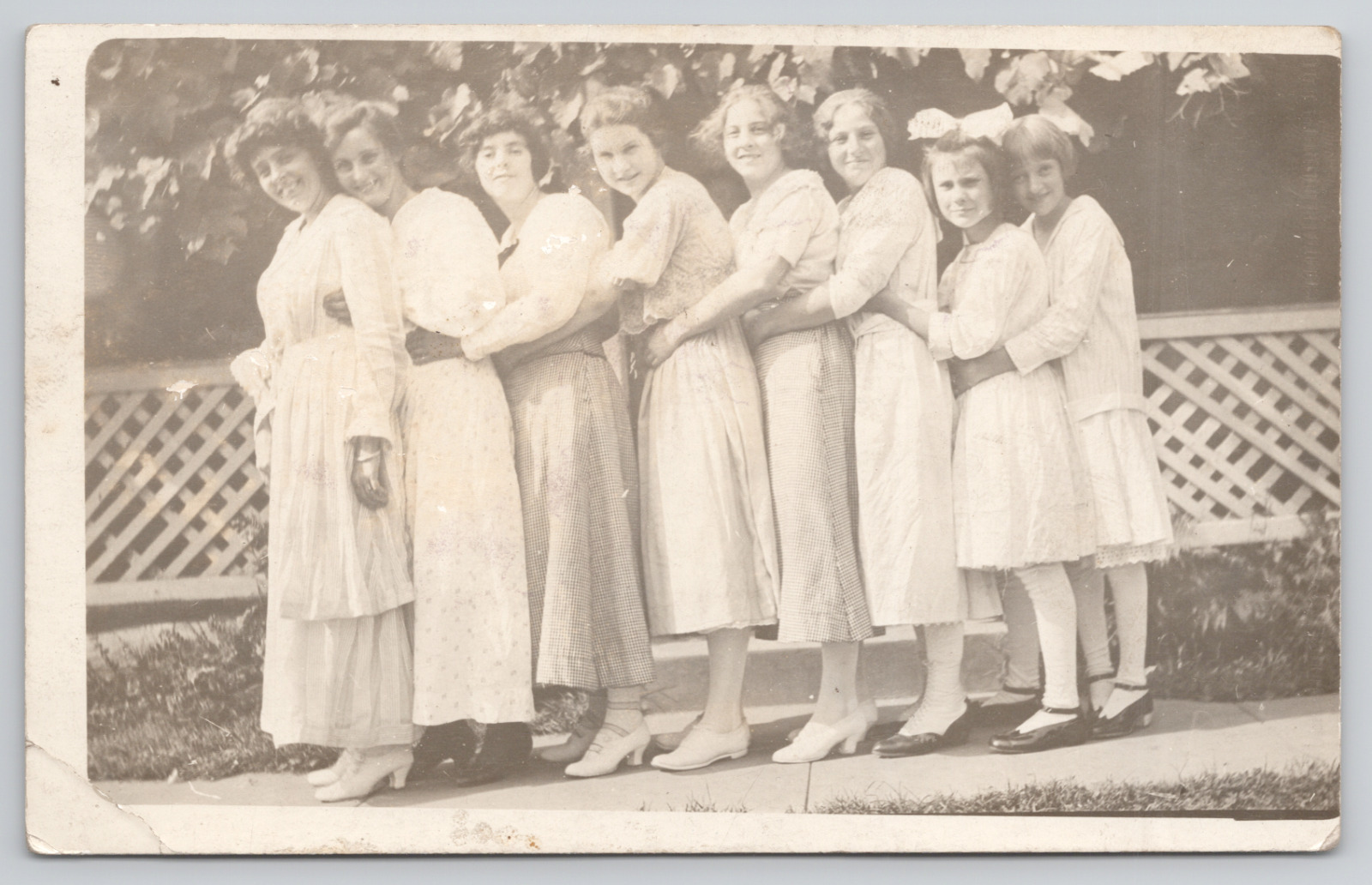 RPPC  Group Of Young Women Wearing White On Sidewalk c1910 Real Photo Postcard