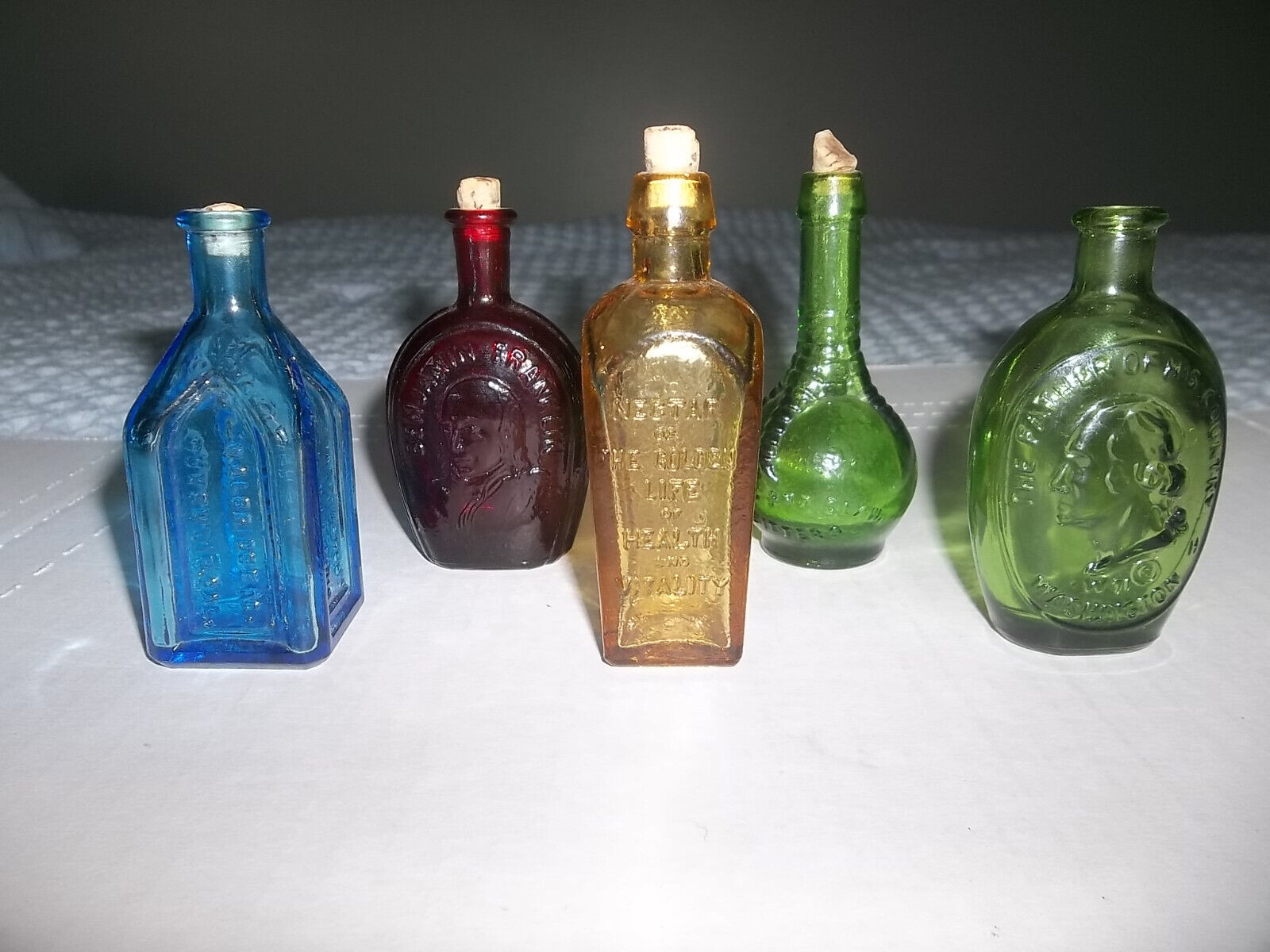 lot of 5 wheaton colored glass miniature bottles