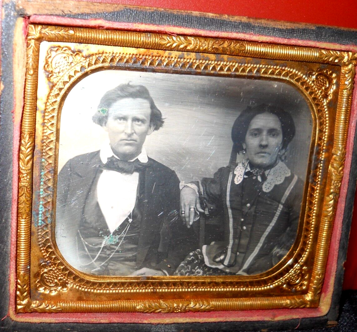 1/6th Size Daguerreotype of older couple in half case, Scoville Extra