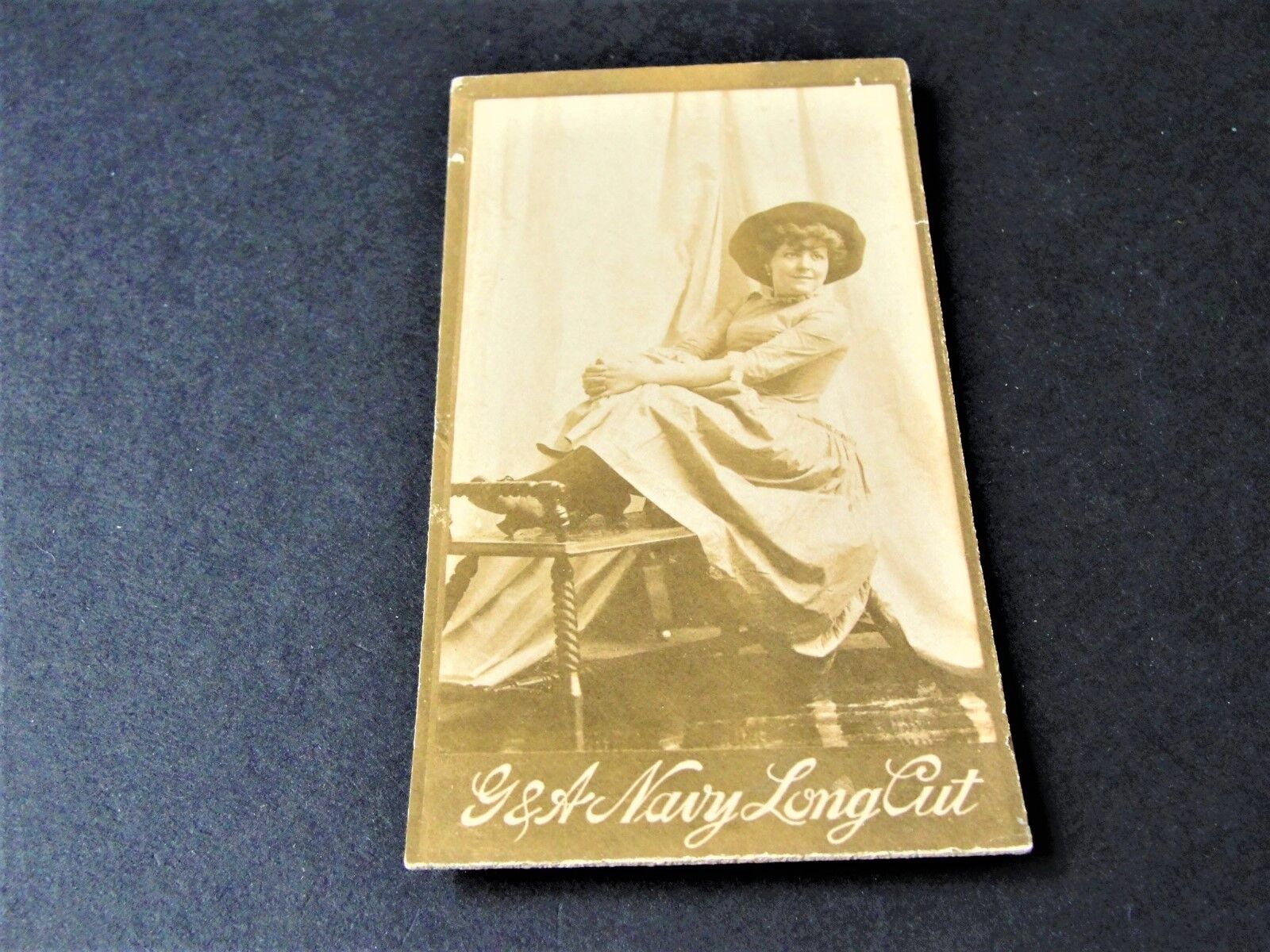 Antique G.W. Gail & Ax's Navy Tobacco Card with black & white image of lady. 
