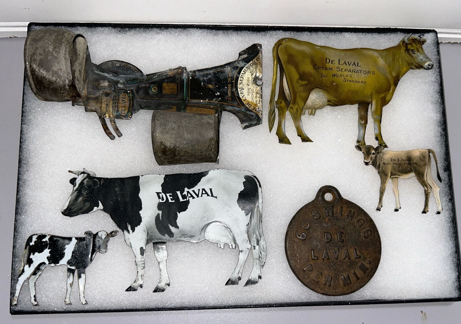 Lot Of De Laval Tin Die Cut Cow Sets And More Advertising.. please see pictures