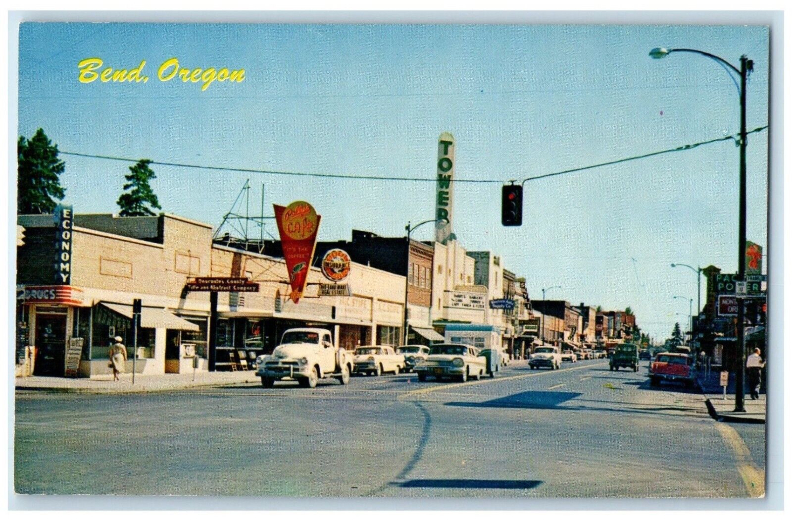 c1960 Busy Day Classic Cars Road Headquarters Downtown Bend Oregon OR Postcard