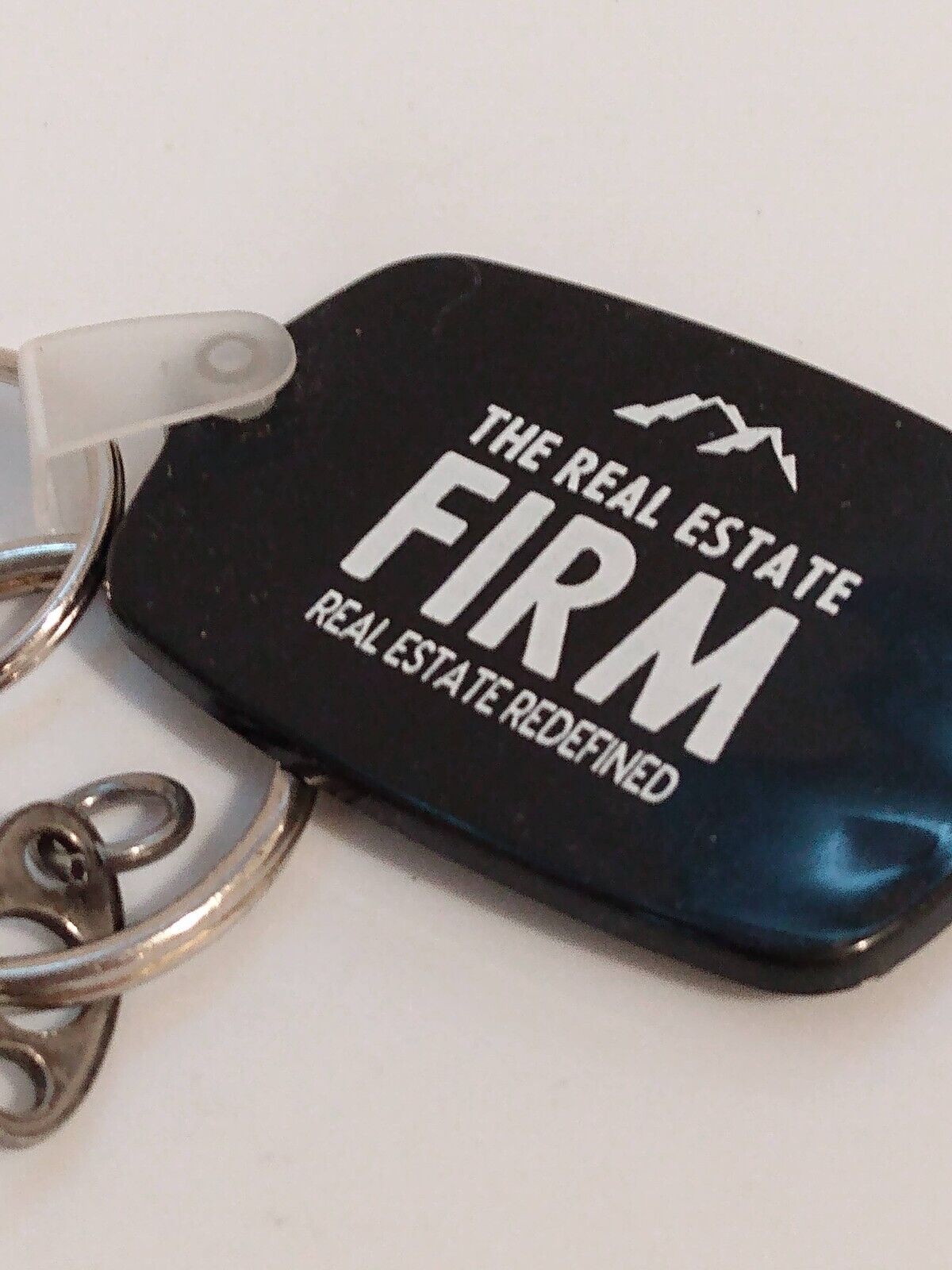 The Real Estate Firm Redefined Promo Keyring