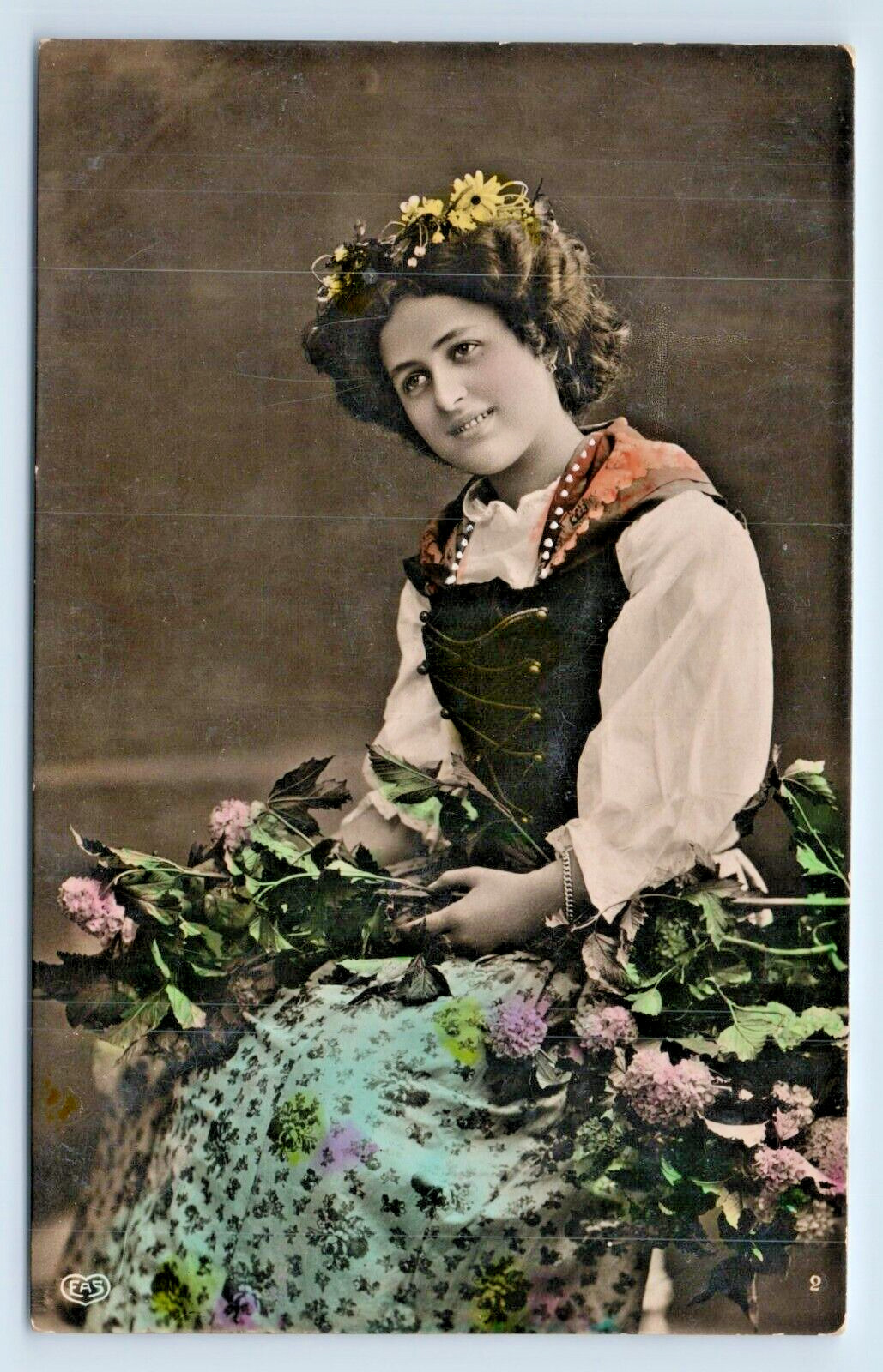 Postcard Tinted RPPC Pretty German Woman Flowers in Lap and in Her Hair EAS