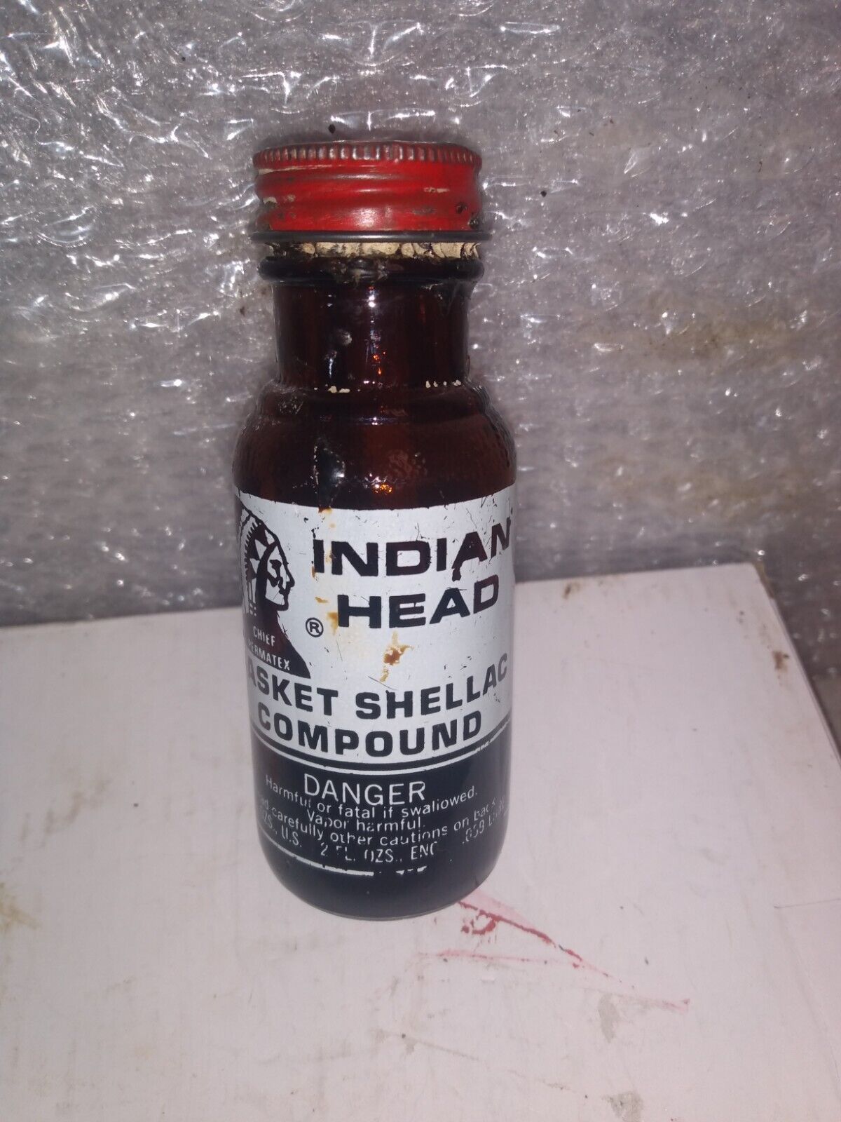 Vintage INDIAN HEAD GASKET SHELLAC COMPOUND Chief Permatex Bottle 2 oz KC Kansas