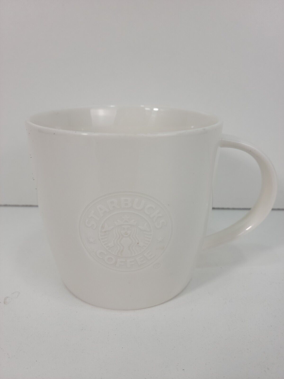 Starbucks Coffee 2009 White Embossed Siren Mermaid Mug Cup Bone China 16oz