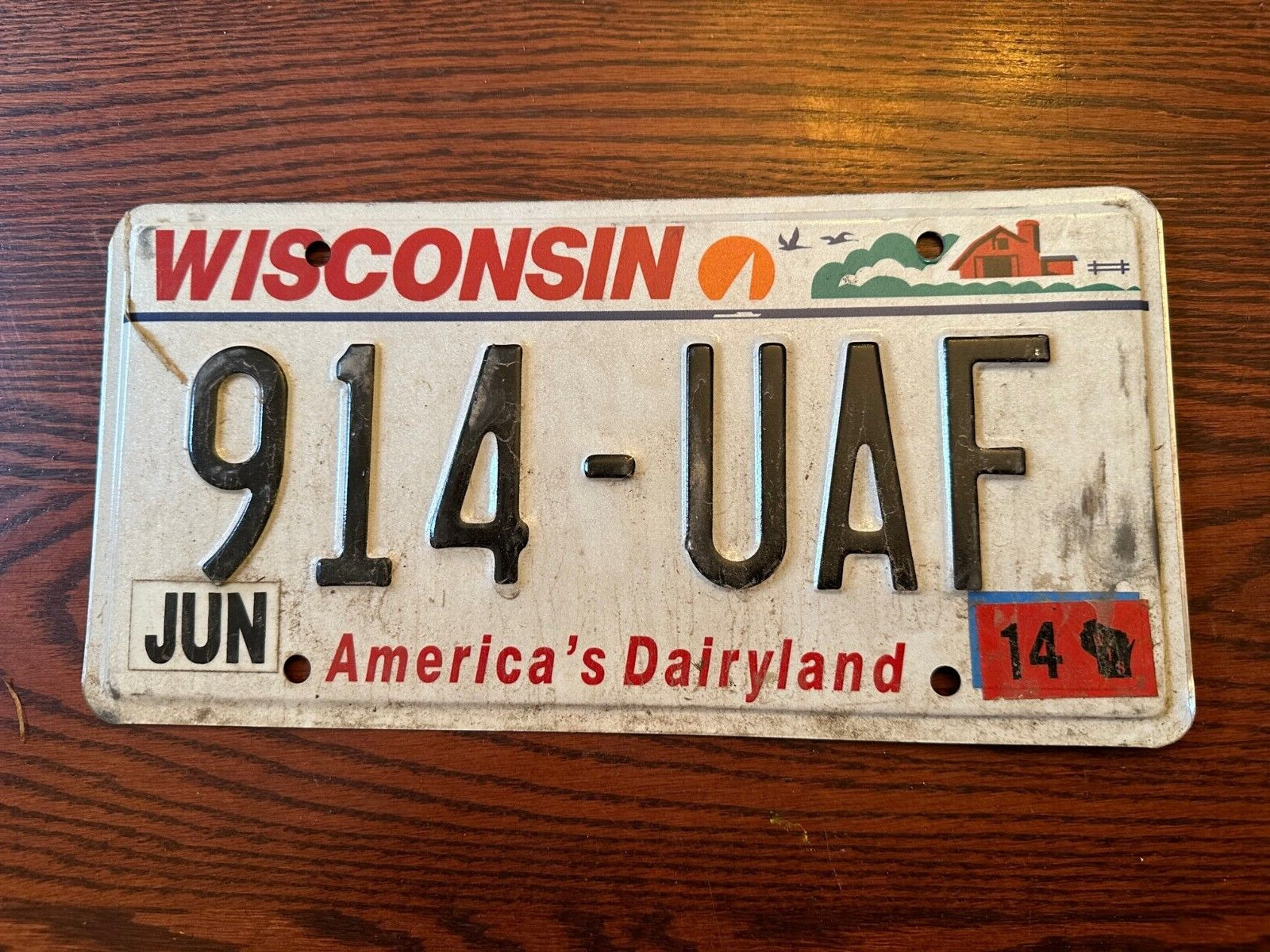 2014 Wisconsin License Plate 914 UAF America\'s Dairyland Authentic WI USA June