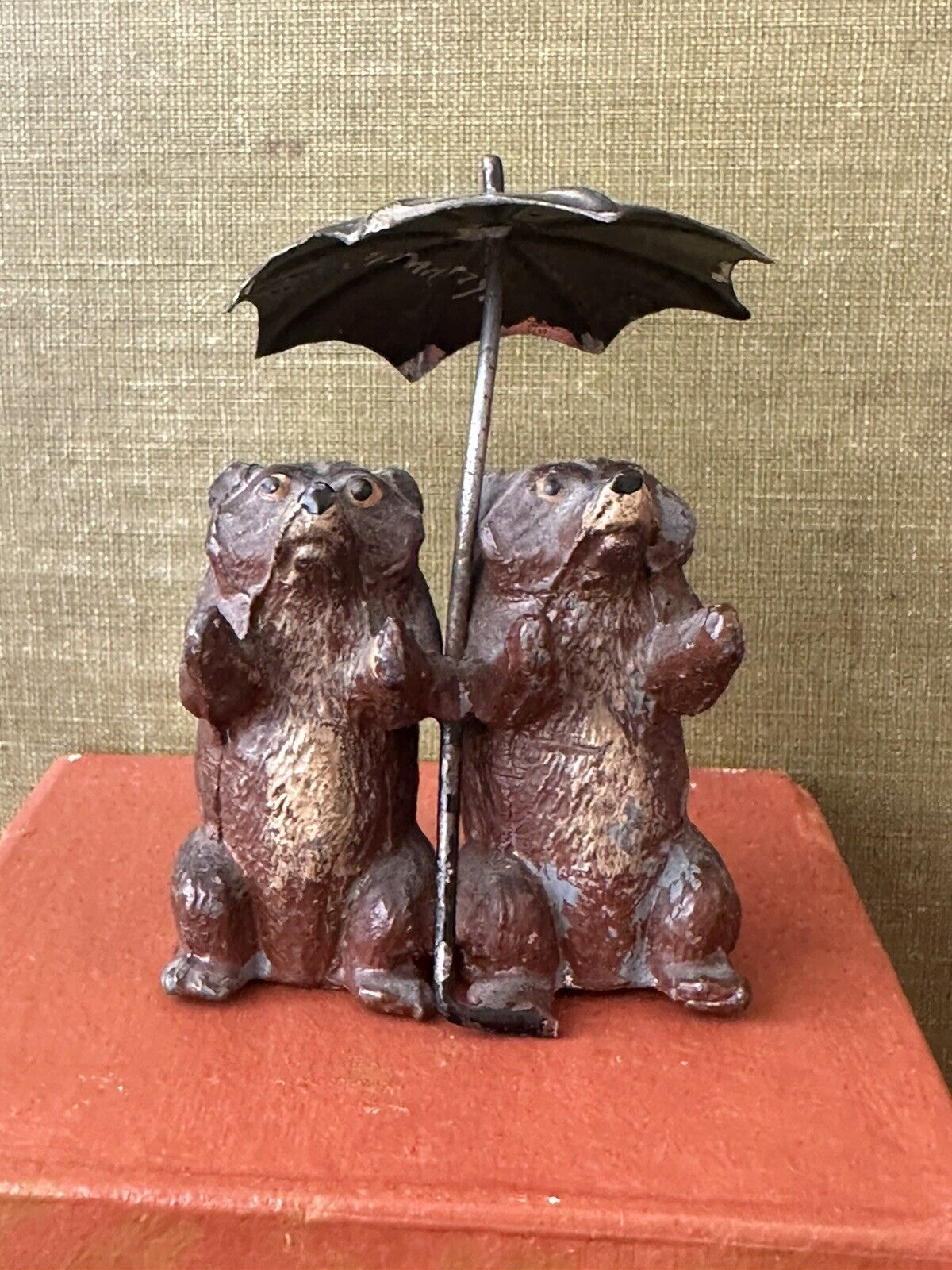 Antique 1910s painted pot metal bears with umbrella figurine made In Germany