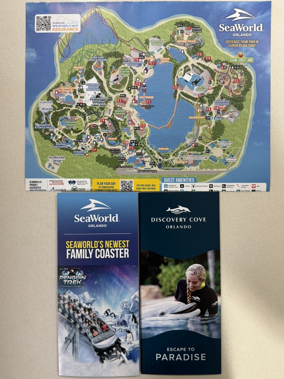 2024 New Sea World Orlando Guide Map + Sea World, and Discovery Cove Brochures.