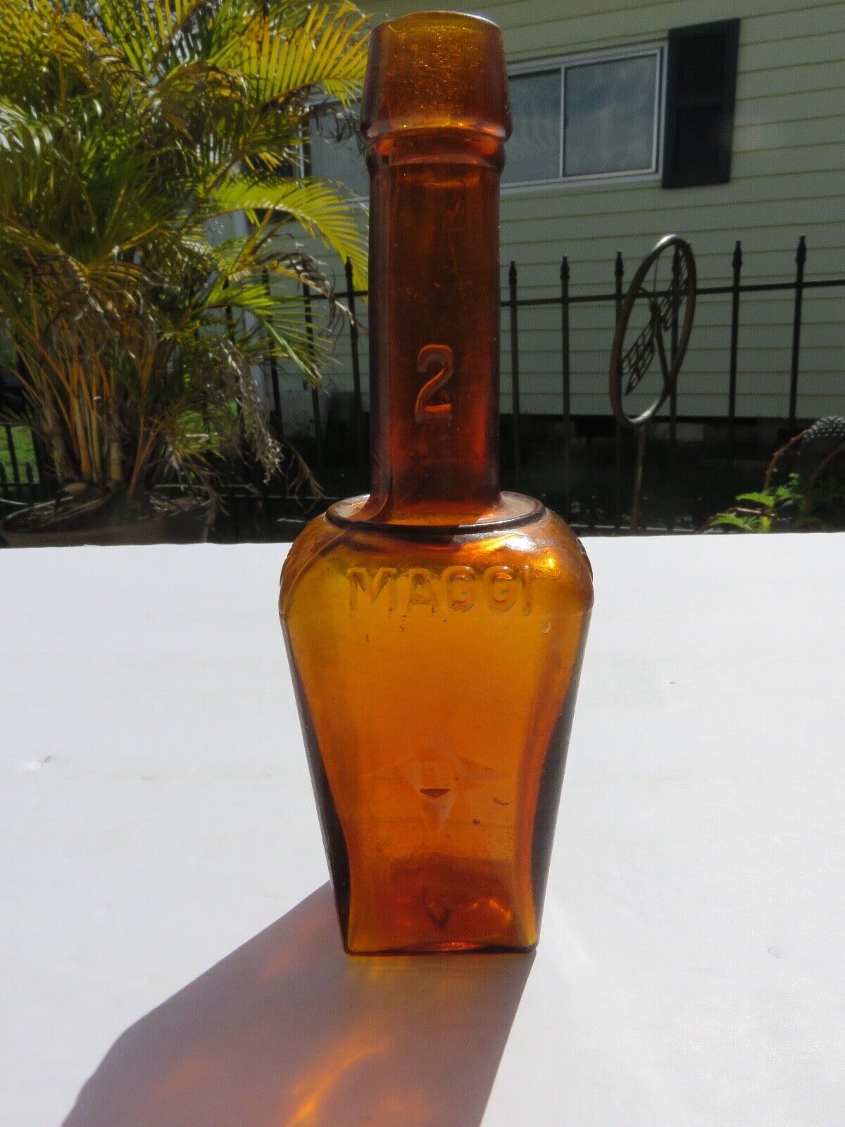 Vintage Maggi 2 Amber Bottle