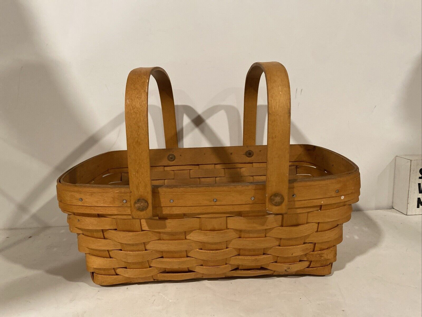 Vintage  Longaberger Double Swing Handles Basket with Wooden Rim Copper Rivets.