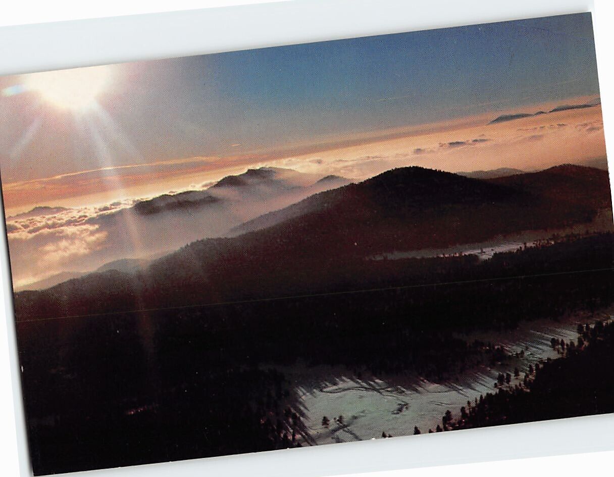 Postcard A Winters Afternoon Sunset over the snow covered San Bernardinos CA USA