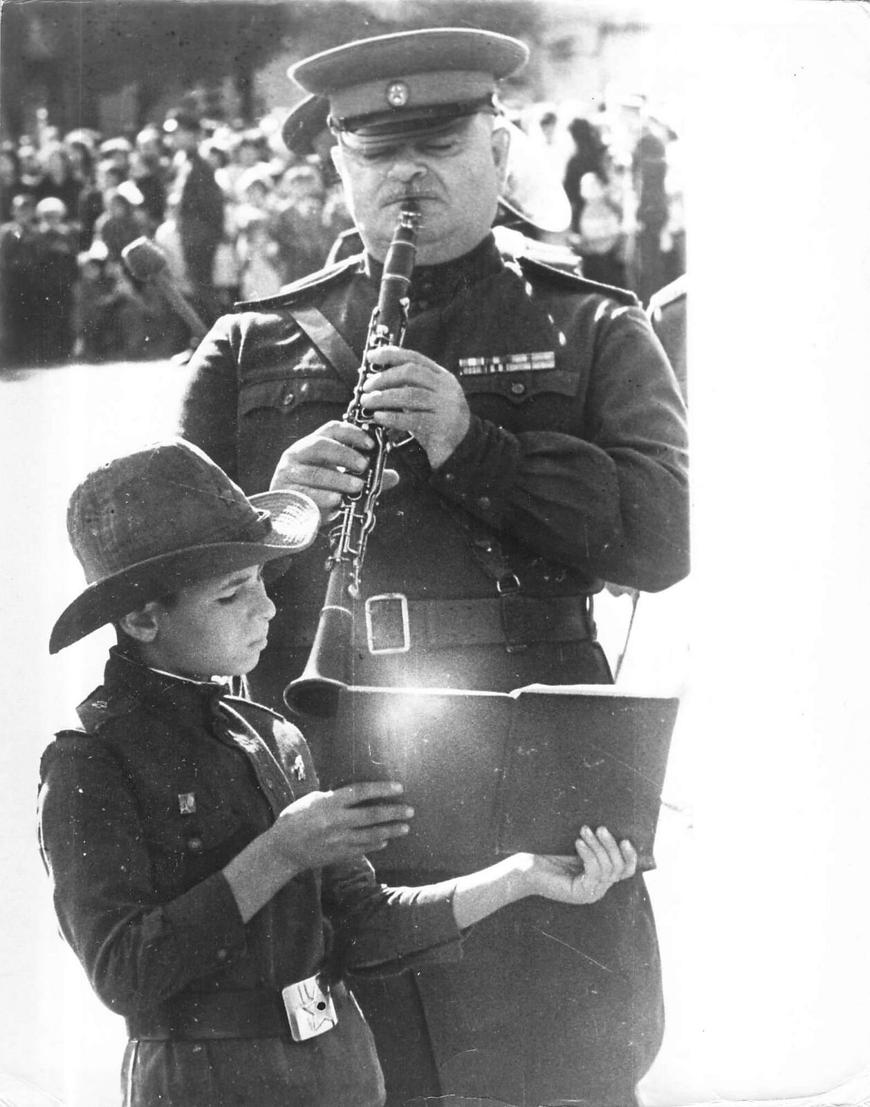 1971 Press Photo Man in Uniform Playing Clarinet Boy Holding Book Soviet Union