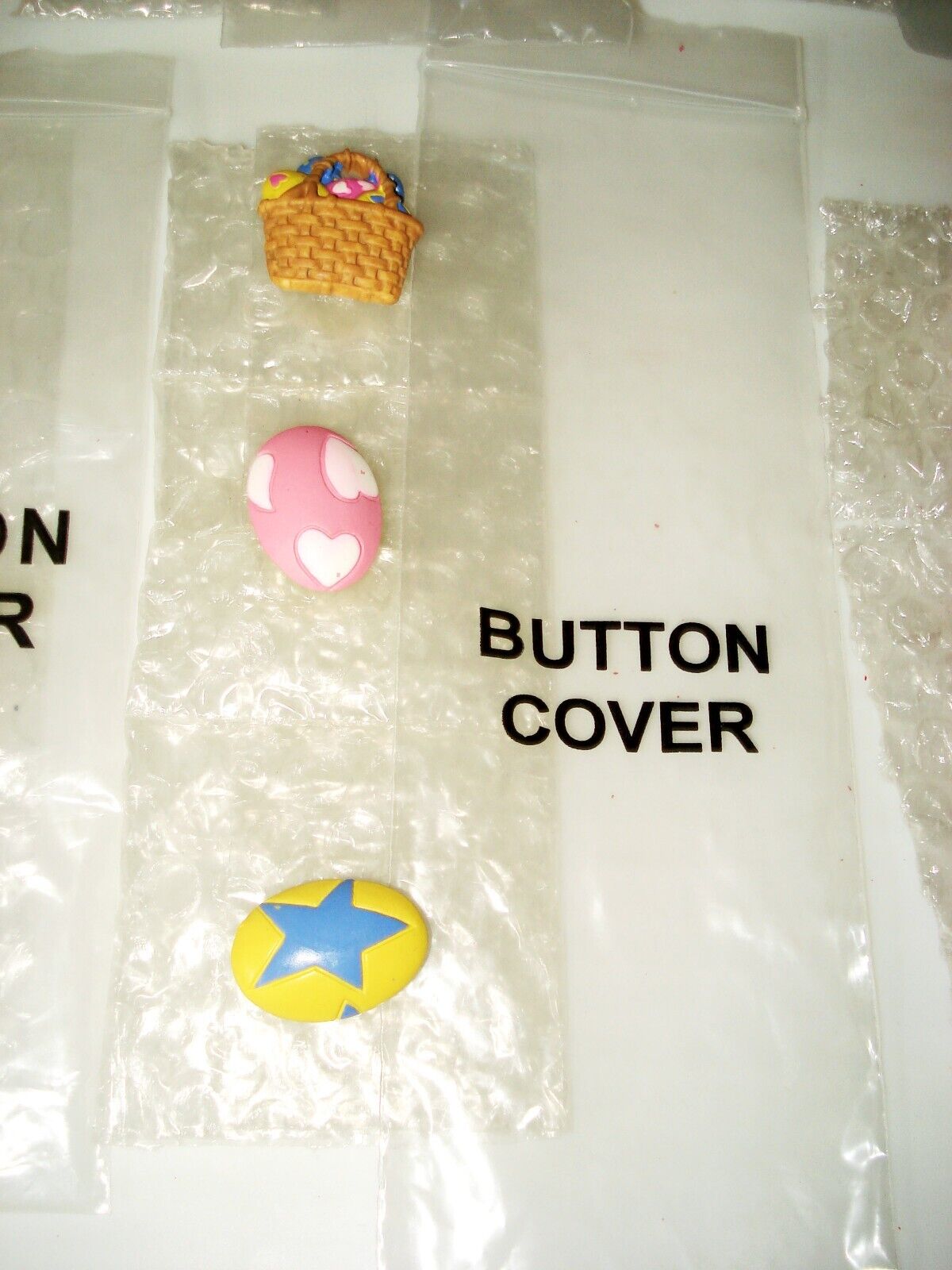 From HSN made for Story Book Knit Clothing -Set Of 3 Button Covers  - Easter