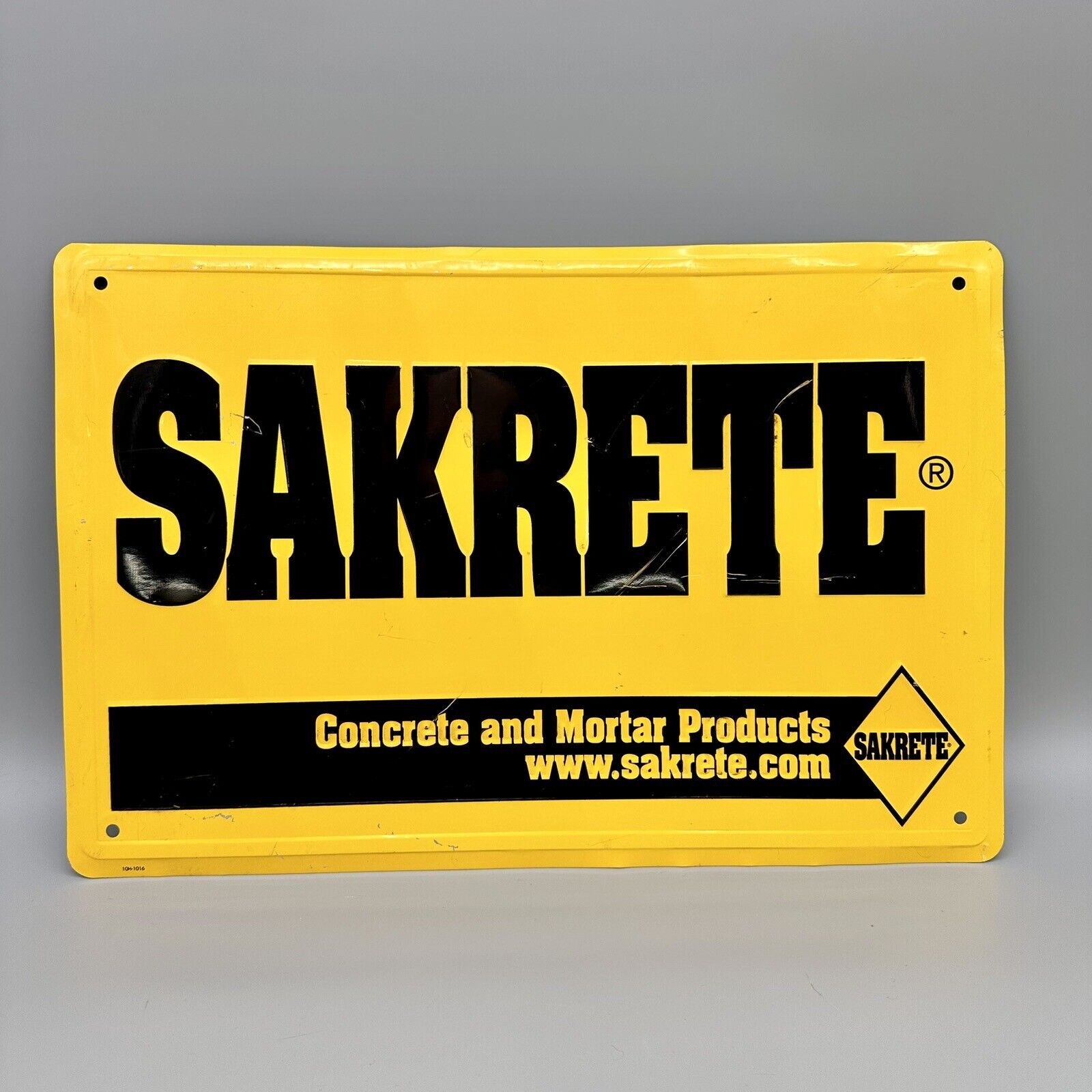Vintage Sakrete Aluminum Embossed Sign 12x18, Yellow