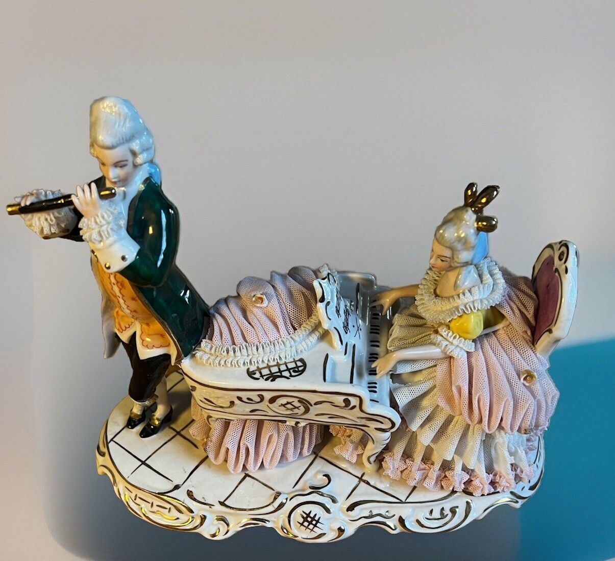 Vintage German Dresden Figurine Man with Flute and Lace Lady with Piano 7 1/4 in