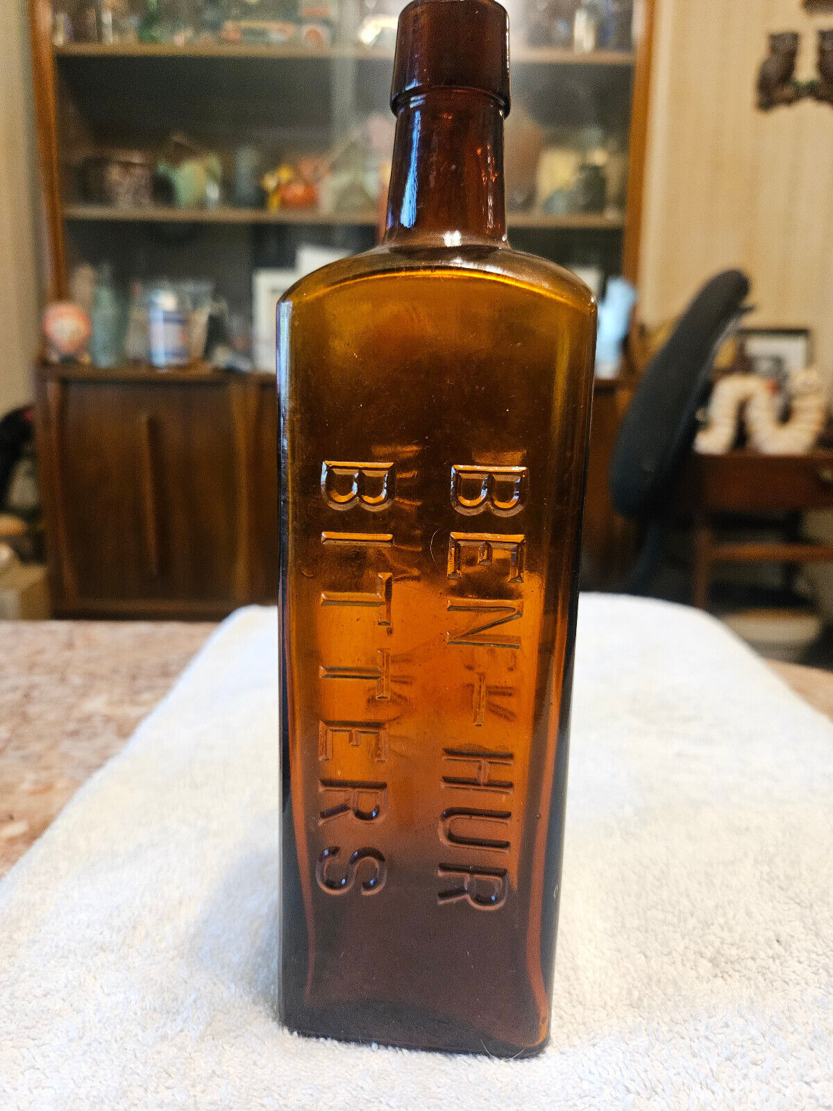 Antique amber ben-hur bitters bottle