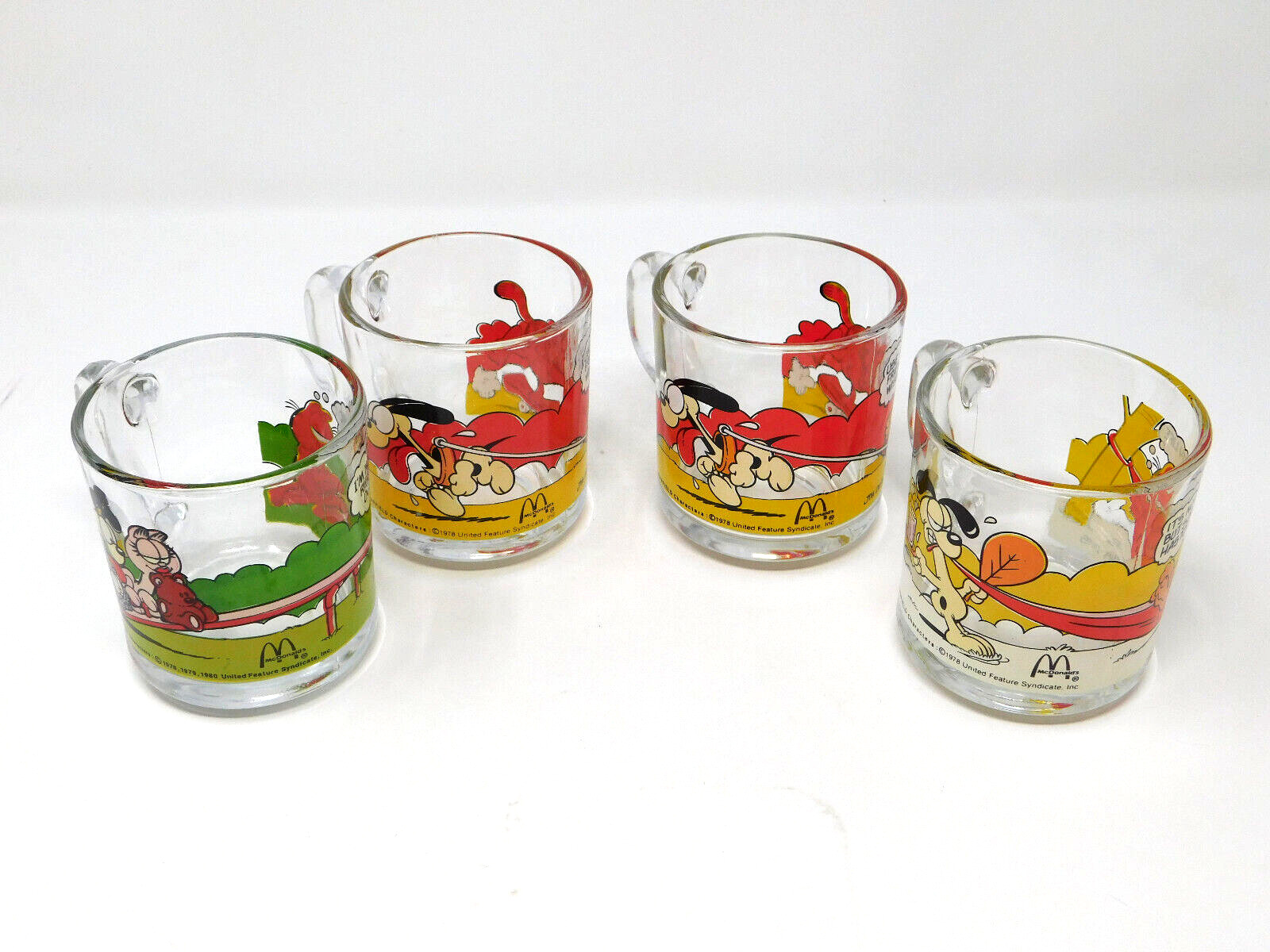 Lot of 4 McDonald\'s Garfield Glass Mugs Cups 1978, 1979, 1980 Garfield Glasses