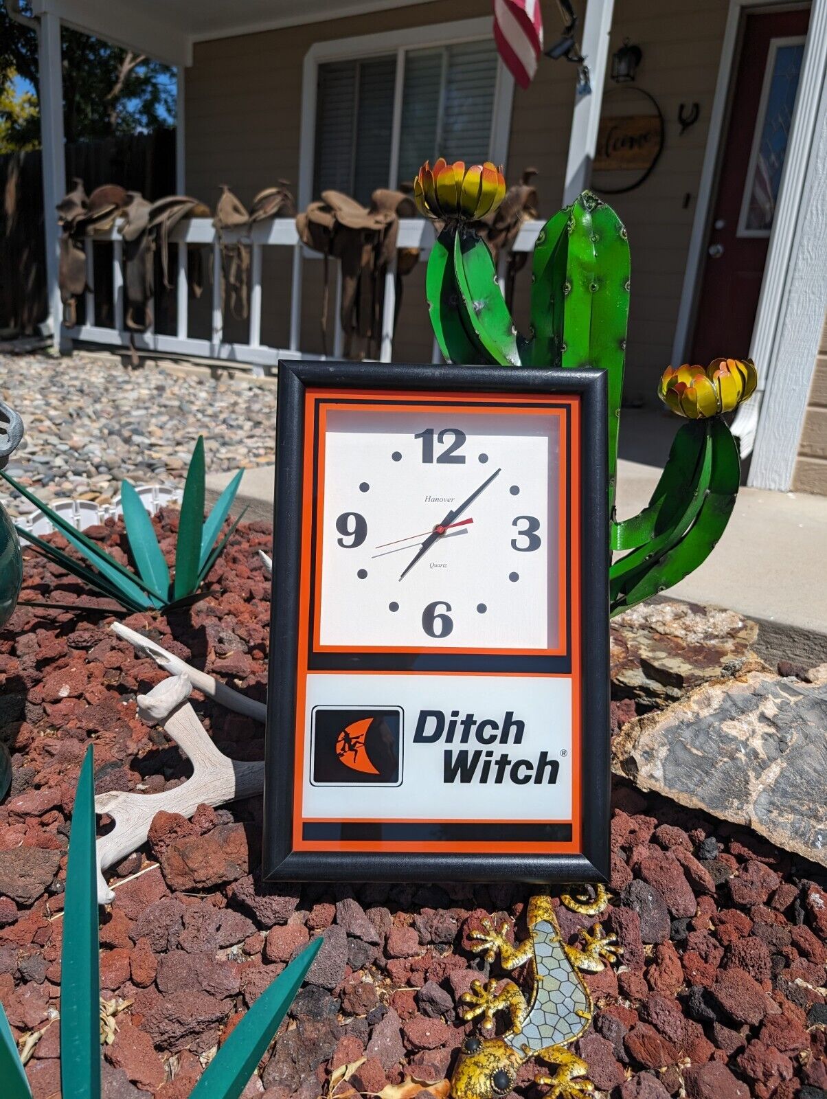 Vintage DITCH WITCH Hanover Quartz Wall Clock Reverse Painted Glass Black Frame
