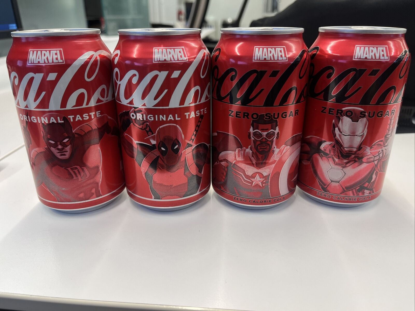 Lot of 4 Marvel Coca Cola Cans - Brand New & Unopened