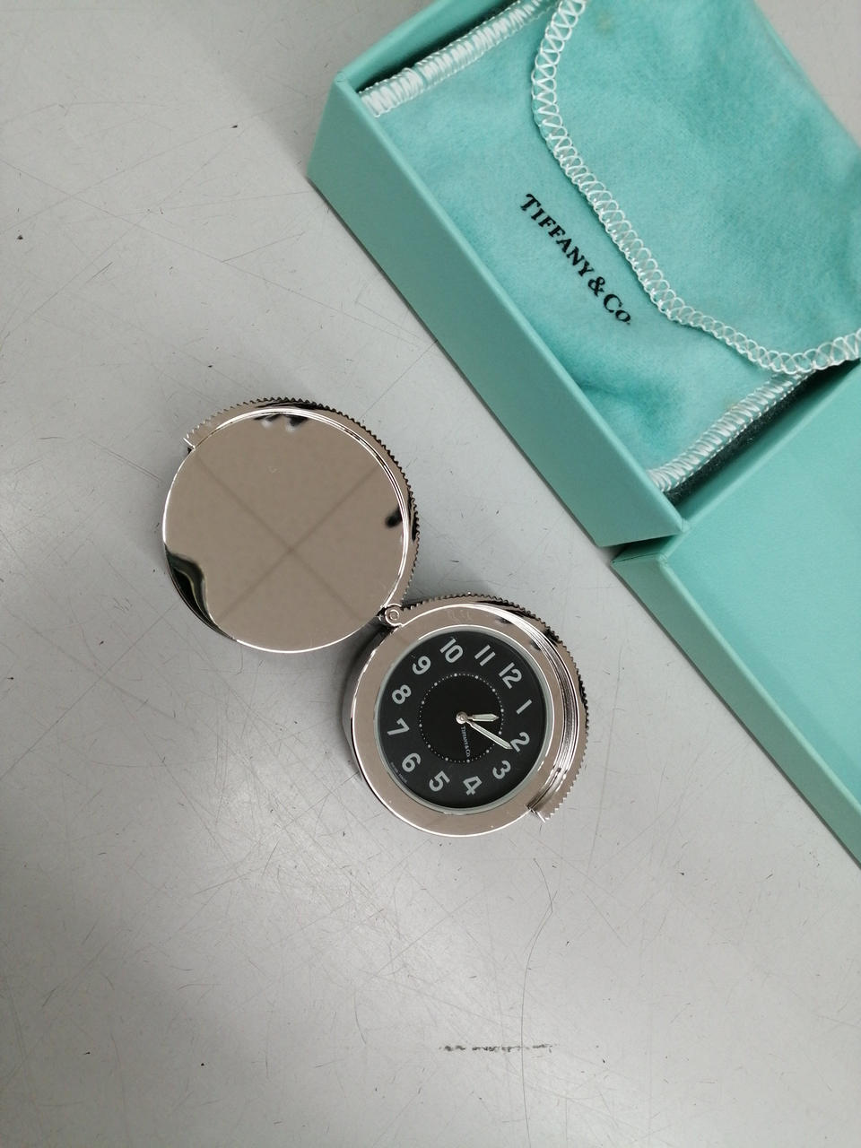Tiffany and Co. Silvertone Brass Swivel Travel Pocket Watch Clock Authentic