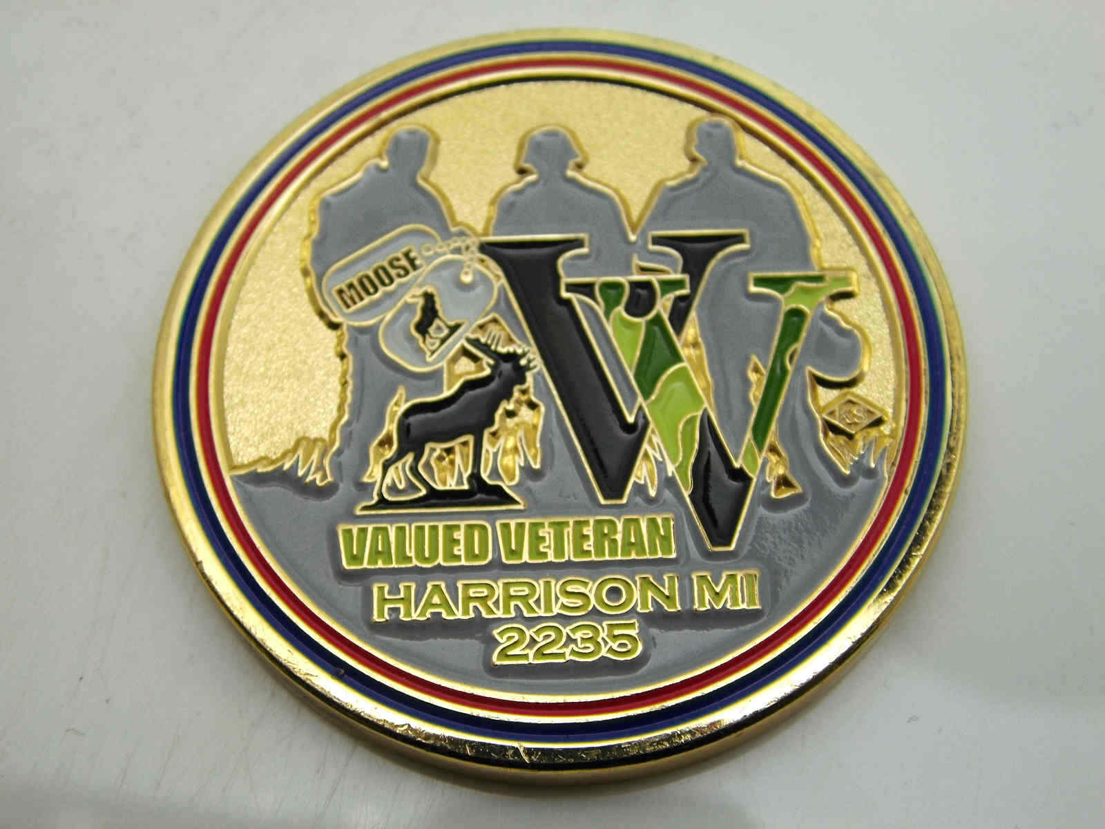 THE LOYAL ORDER OF THE MOOSE SYANDS BEHIND OUR VETERANS CHALLENGE COIN