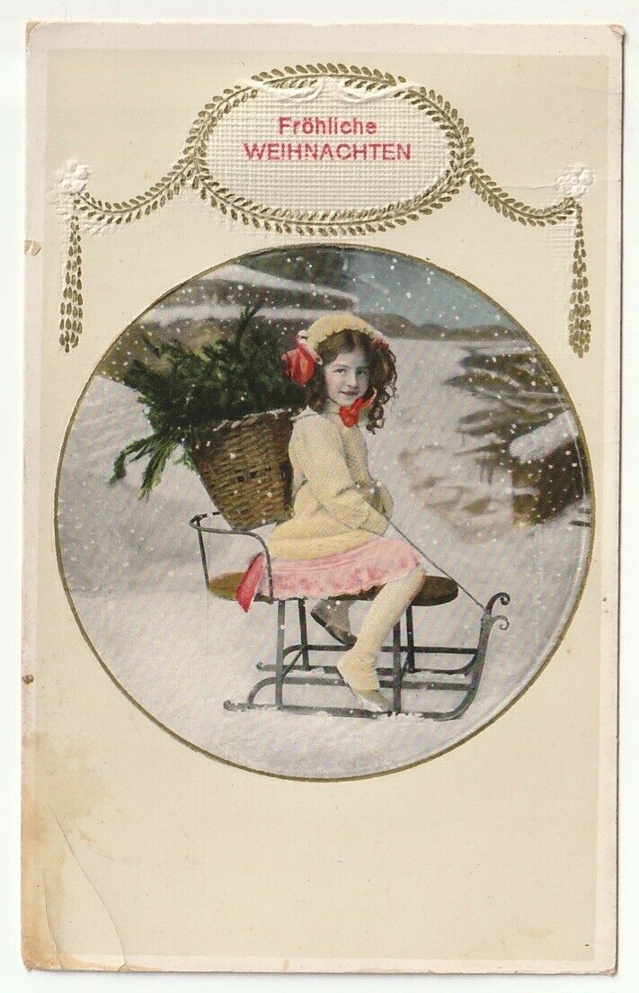 1911 Embossed German Christmas PC colorized girl on sled in snow