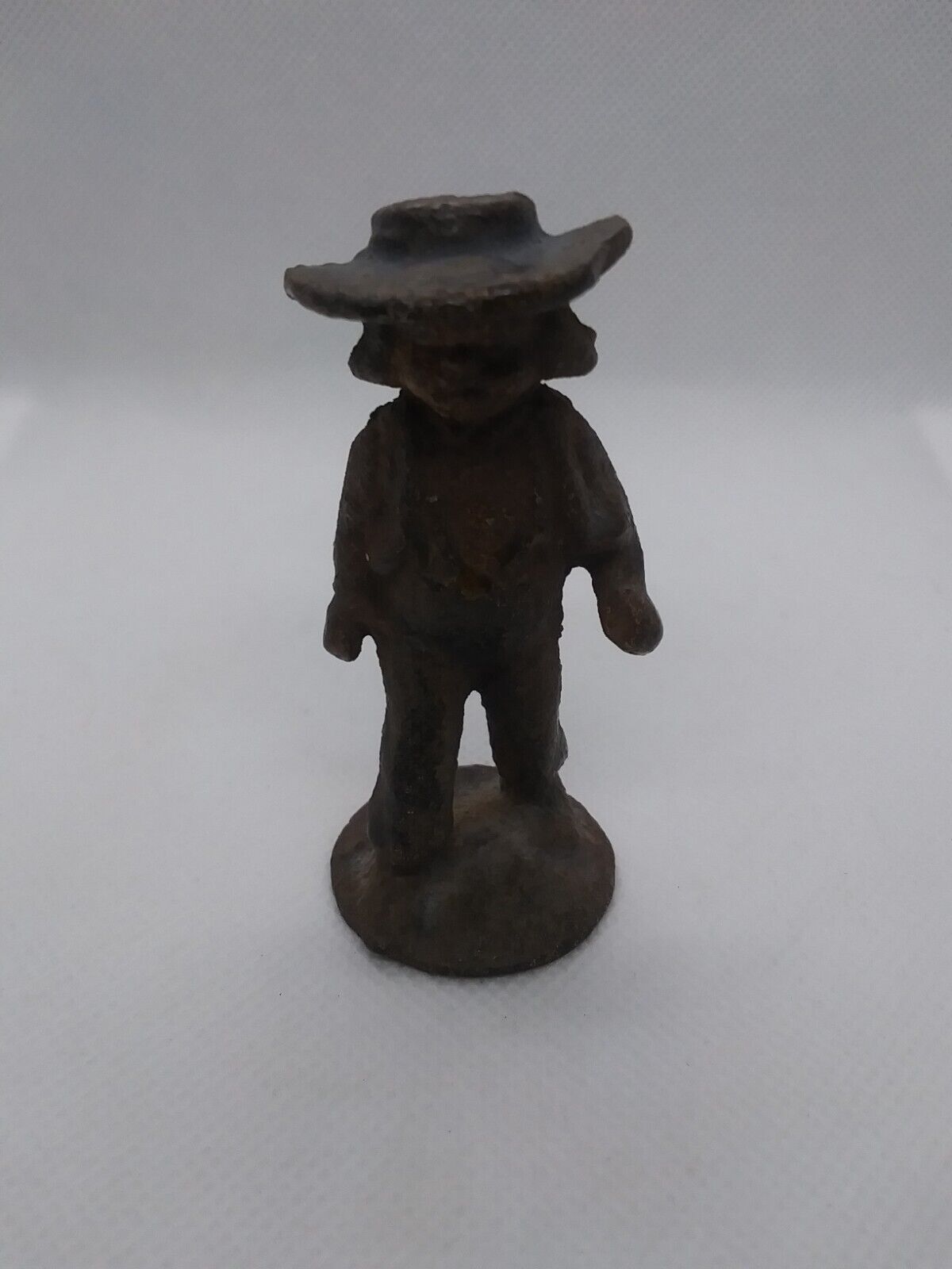 Vintage Cast Iron Boy With Hat Figure