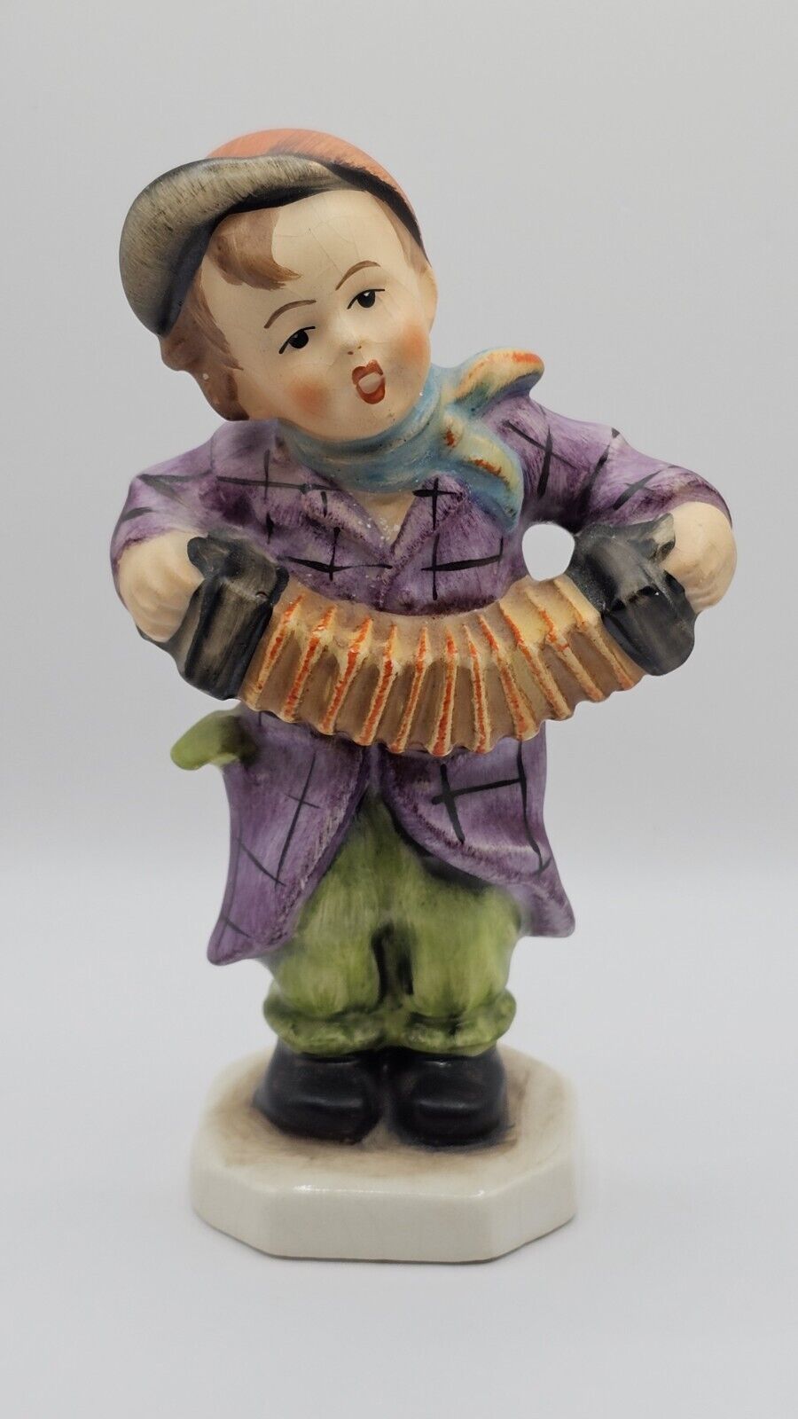 Vintage  Friedel  figurine. From Germany original boy With Accordion.