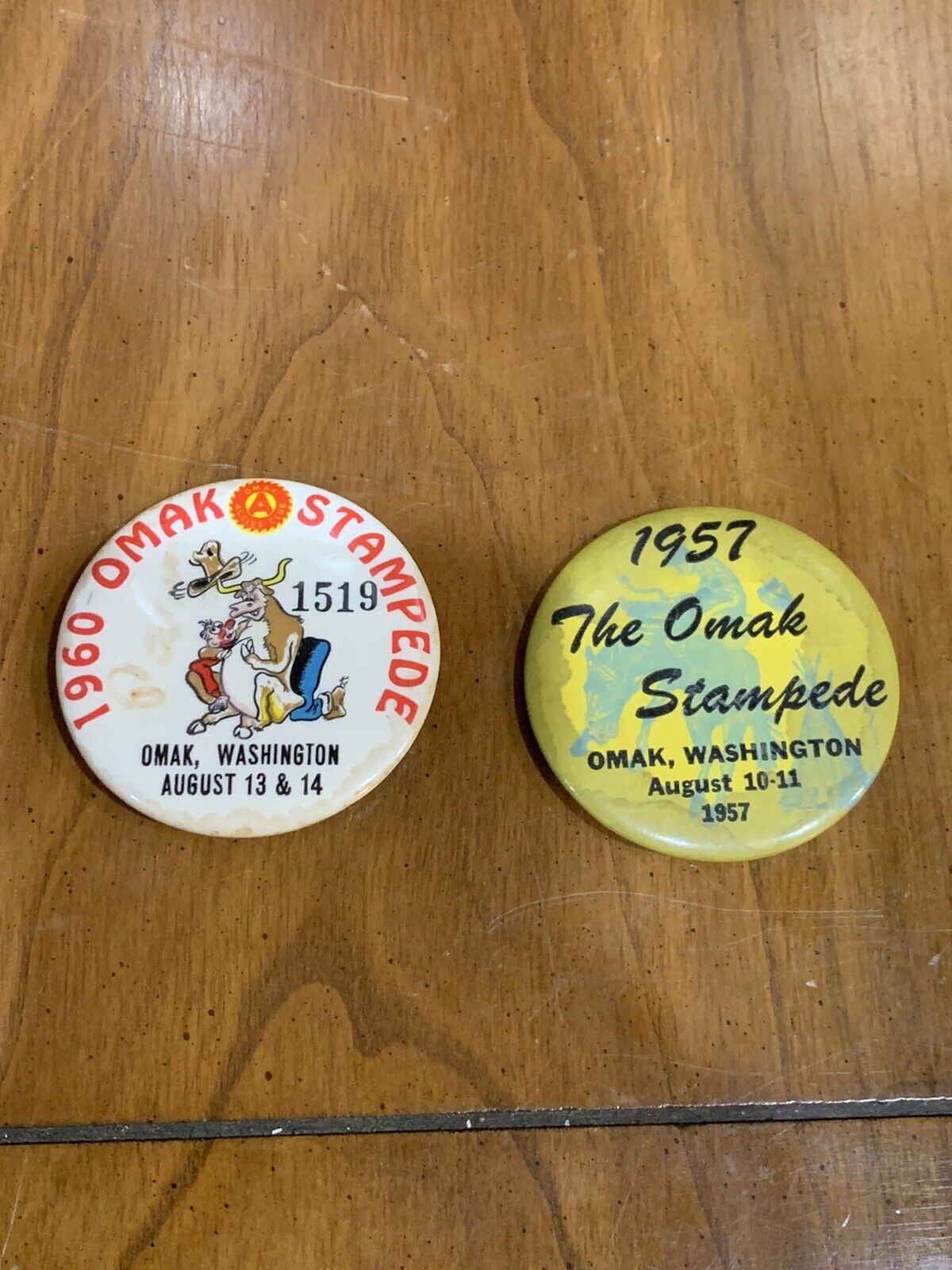 Two Vintage 1957 And 1961 The Omak Stampede Omak, Washington Pin Back Buttons