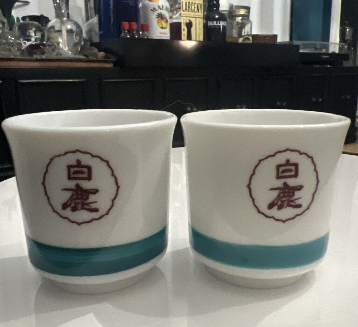 Set Of 2 Japanese Sake Cups Kuromatsu Hakushika White and Green