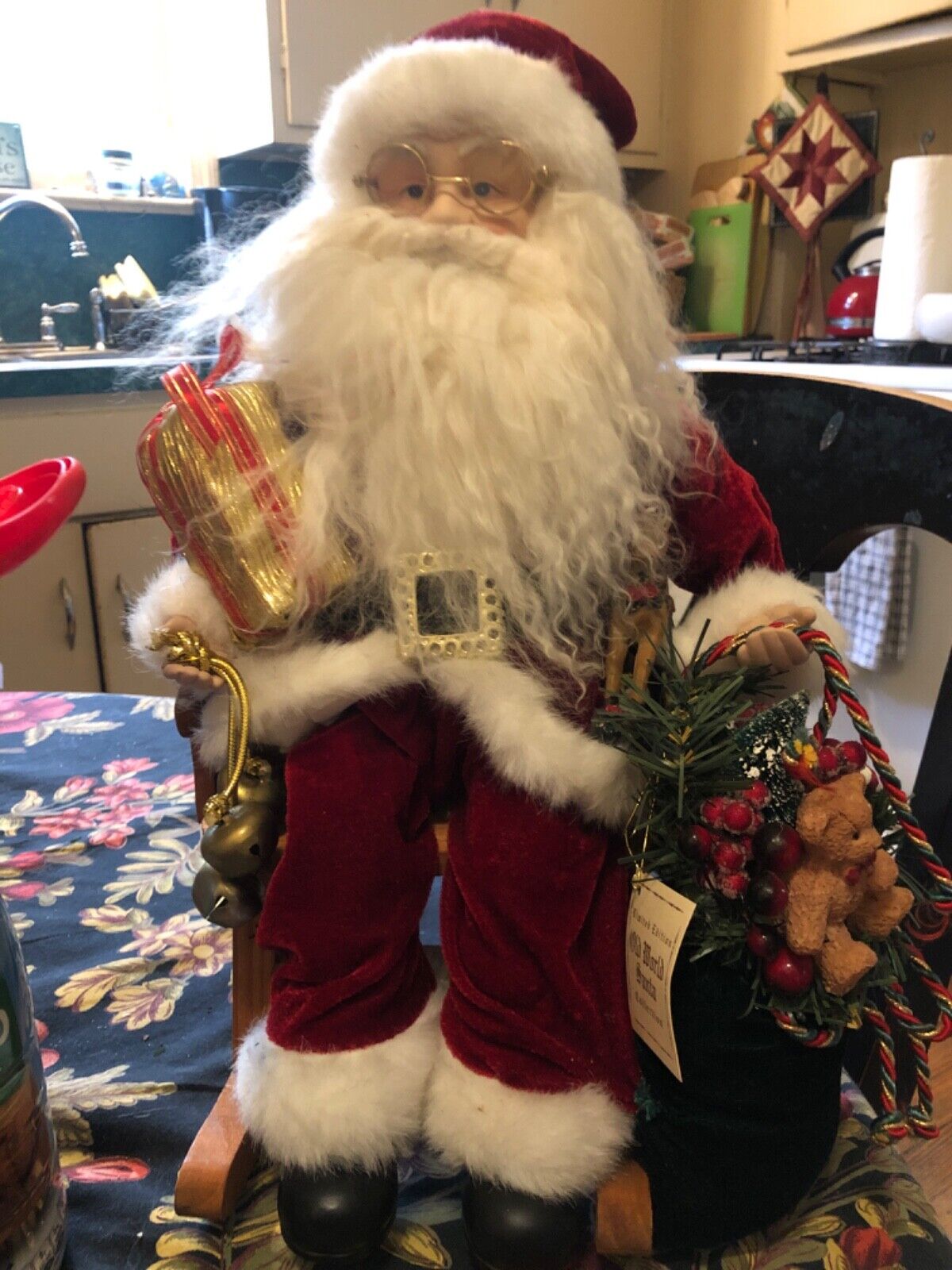2004 old world santa sitting on rocker with toys collectable