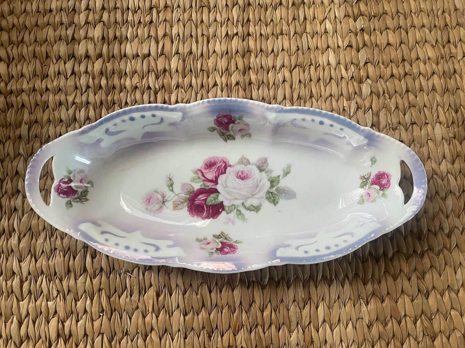Beautiful German Dish, handles are open on both sides, painted Roses on inside.