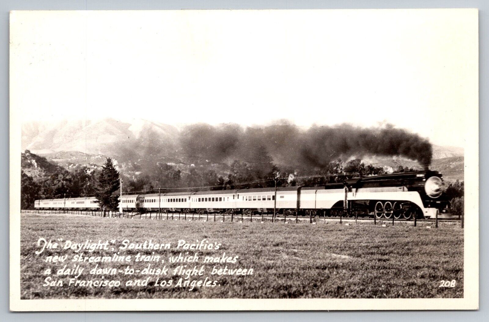 Daylight Streamline Train Real Photo Postcard. RPPC. Southern Pacific Co. 1941
