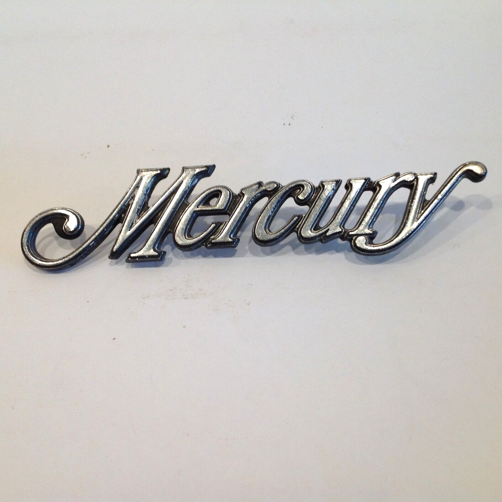 Vintage OEM 1974-75 Mercury Emblem Logo
