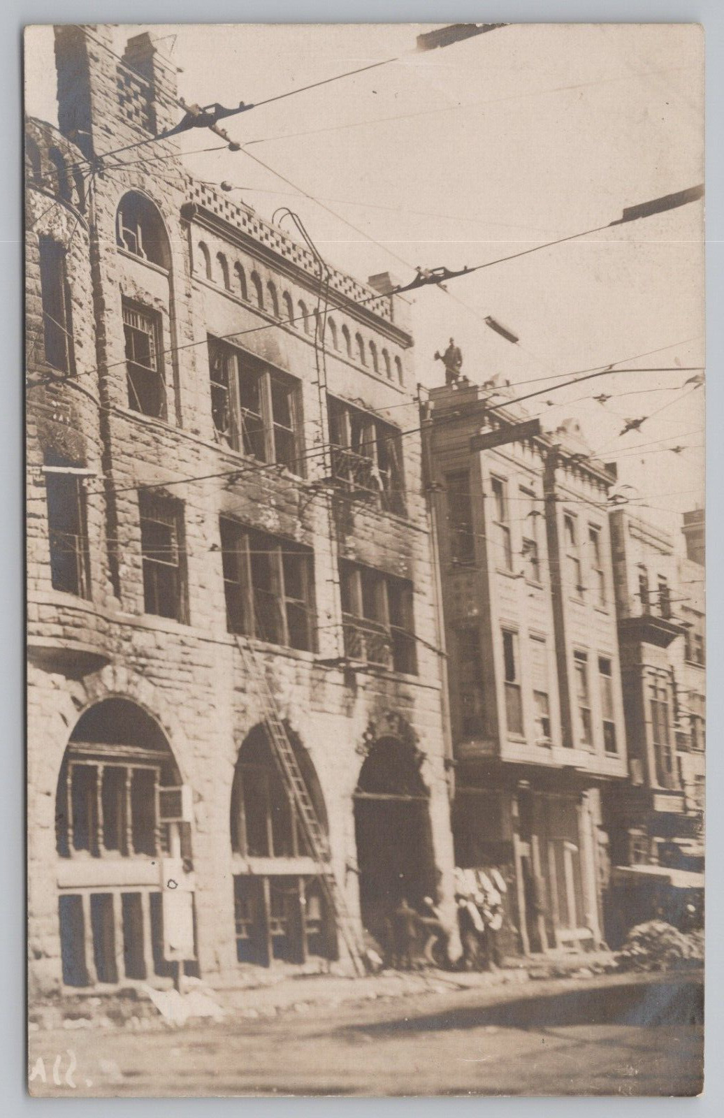RPPC Workers and Possible Firemen Burnt Downtown Building c1920  Photo Postcard
