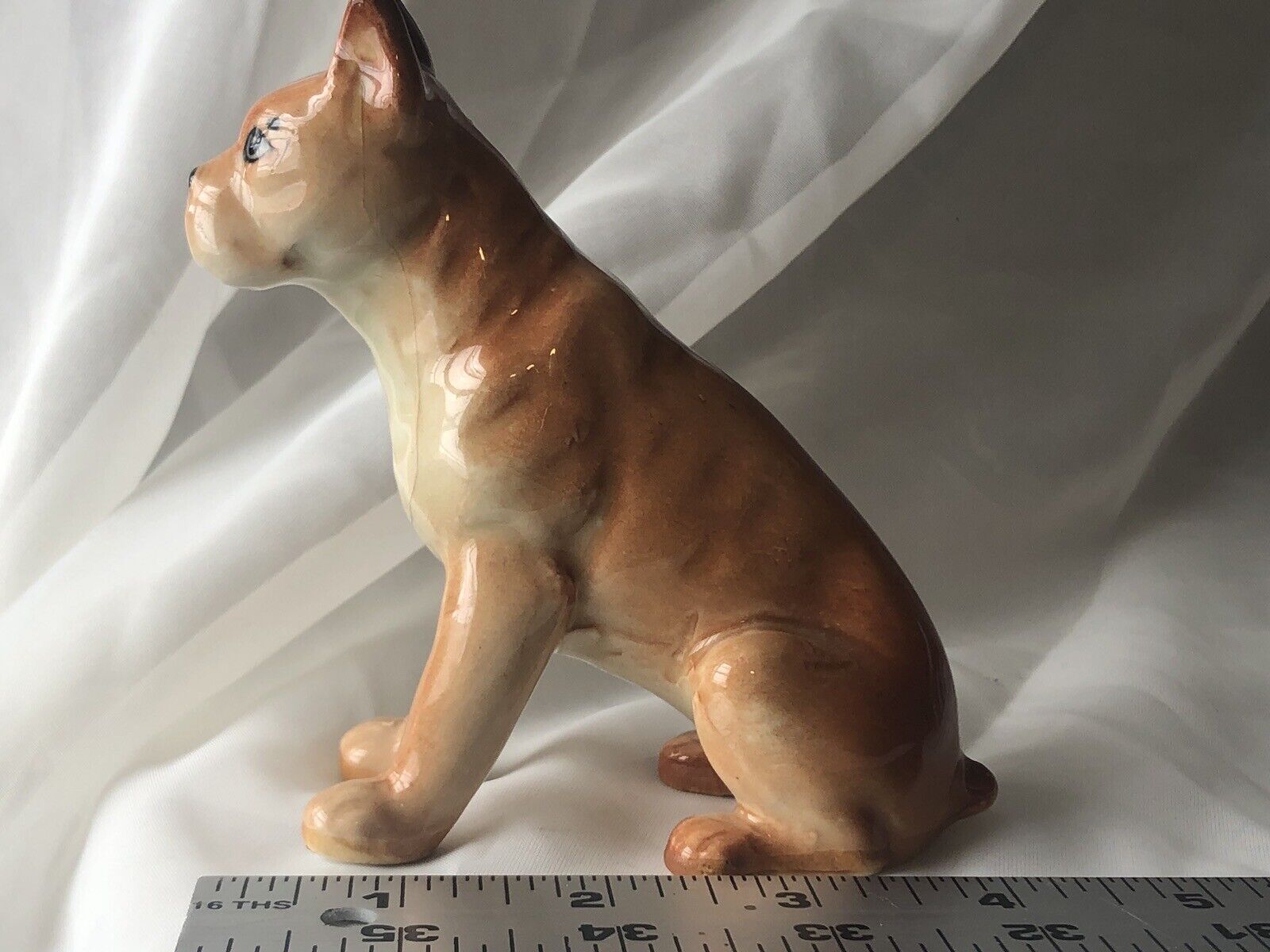 Sitting Boxer Dog Figurine With Glossy Finish