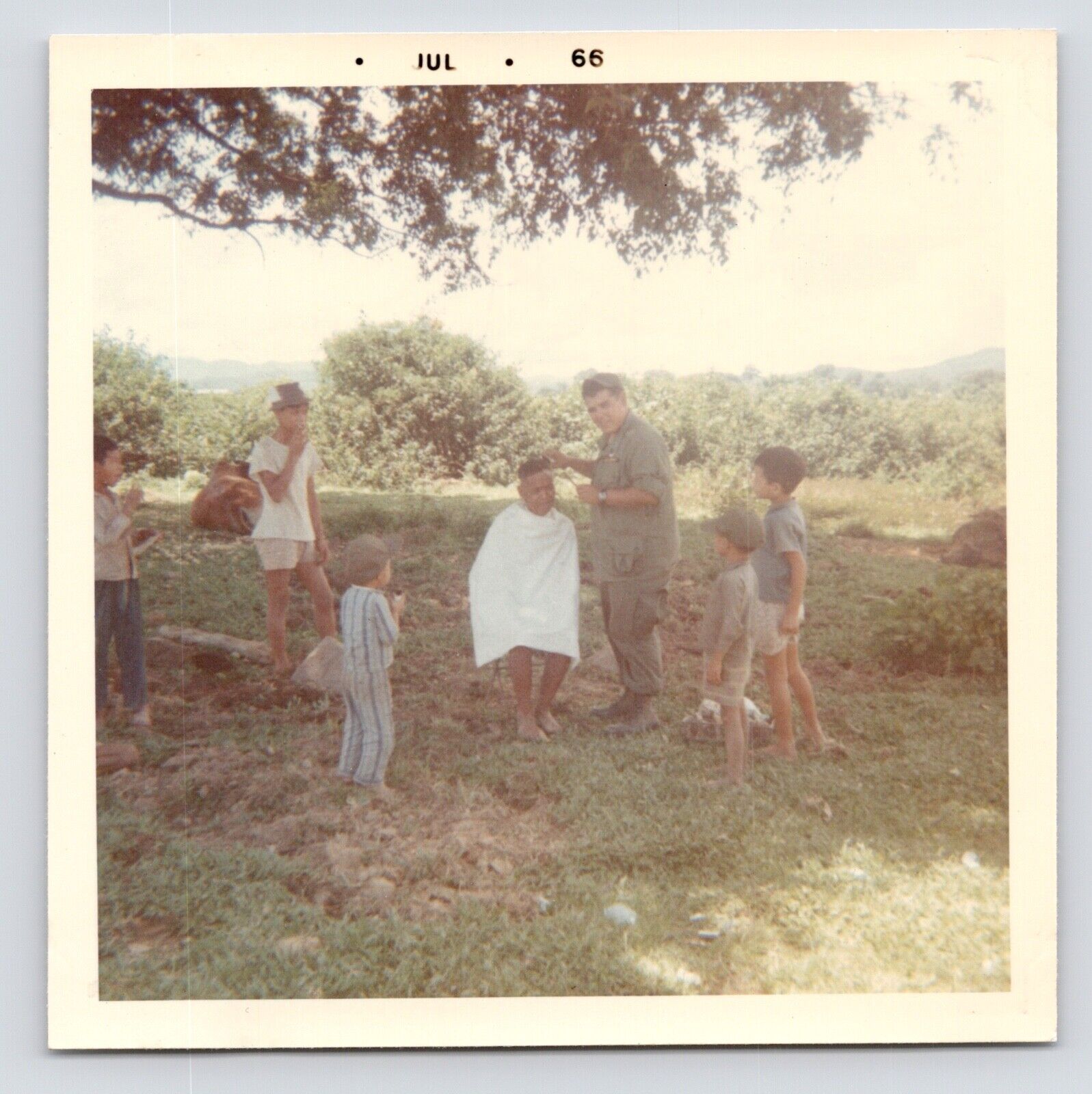1966 Vietnam War US Army GI Cutting Villager\'s Hair Kids Original Vintage Photo