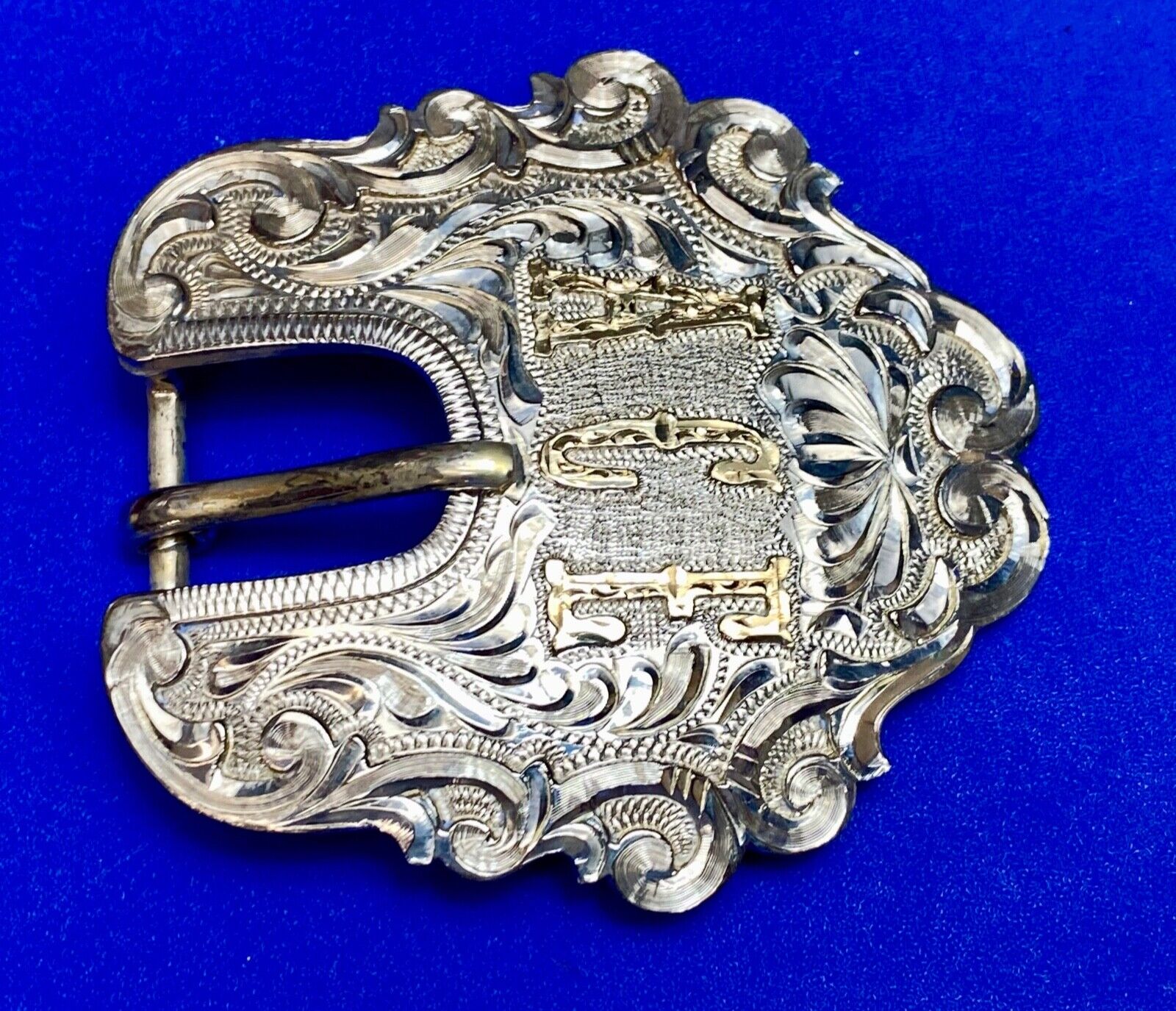Vintage ACE Western cowboys flower swirl belt buckle design by DALE Chavez