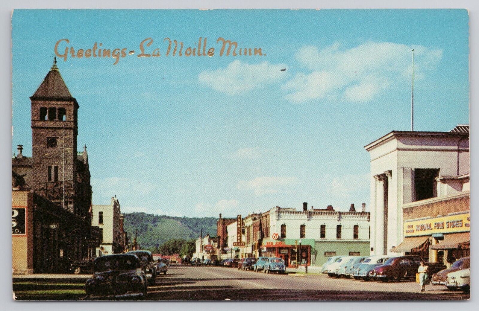 Greetings La Moille Minnesota 1950s Postcard Downtown Winona Bank Red Owl cars