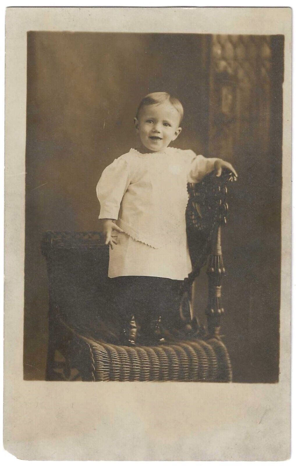 RPPC Postcard Smiling Small Child on Chair, Real Photo Studio Portrait