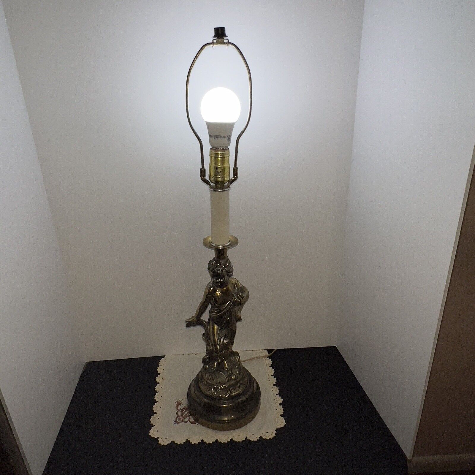 Antique figured bronze Art Nouveau electric lamp, figurine of a boy.