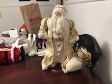 Santa Clause Figurine Holding Bag of Presents picture