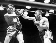 Robert Villemain sends a quick jab toward Sugar Ray Robinson s jaw .. Old Photo picture